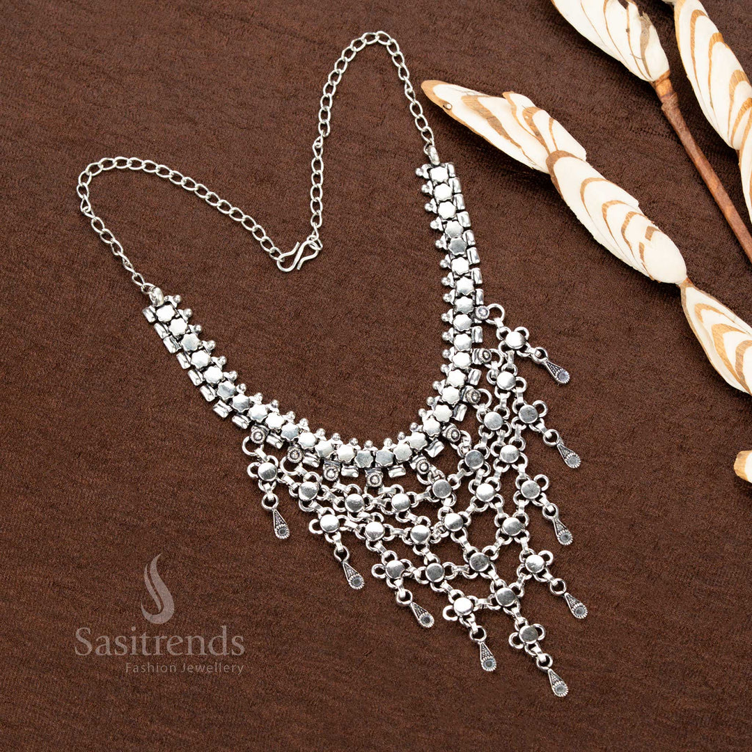 German silver oxidised festive necklace with stone details and extended chain – Sasitrends