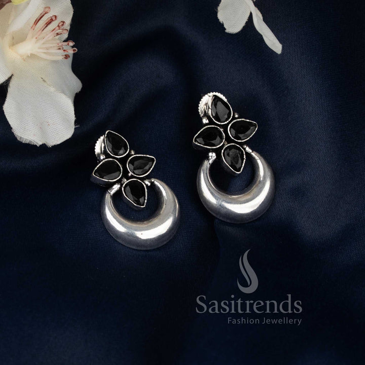 Beautiful black oxidised floral half moon earrings showcasing artistic craftsmanship and perfect for ethnic Navaratri styling by Sasitrends