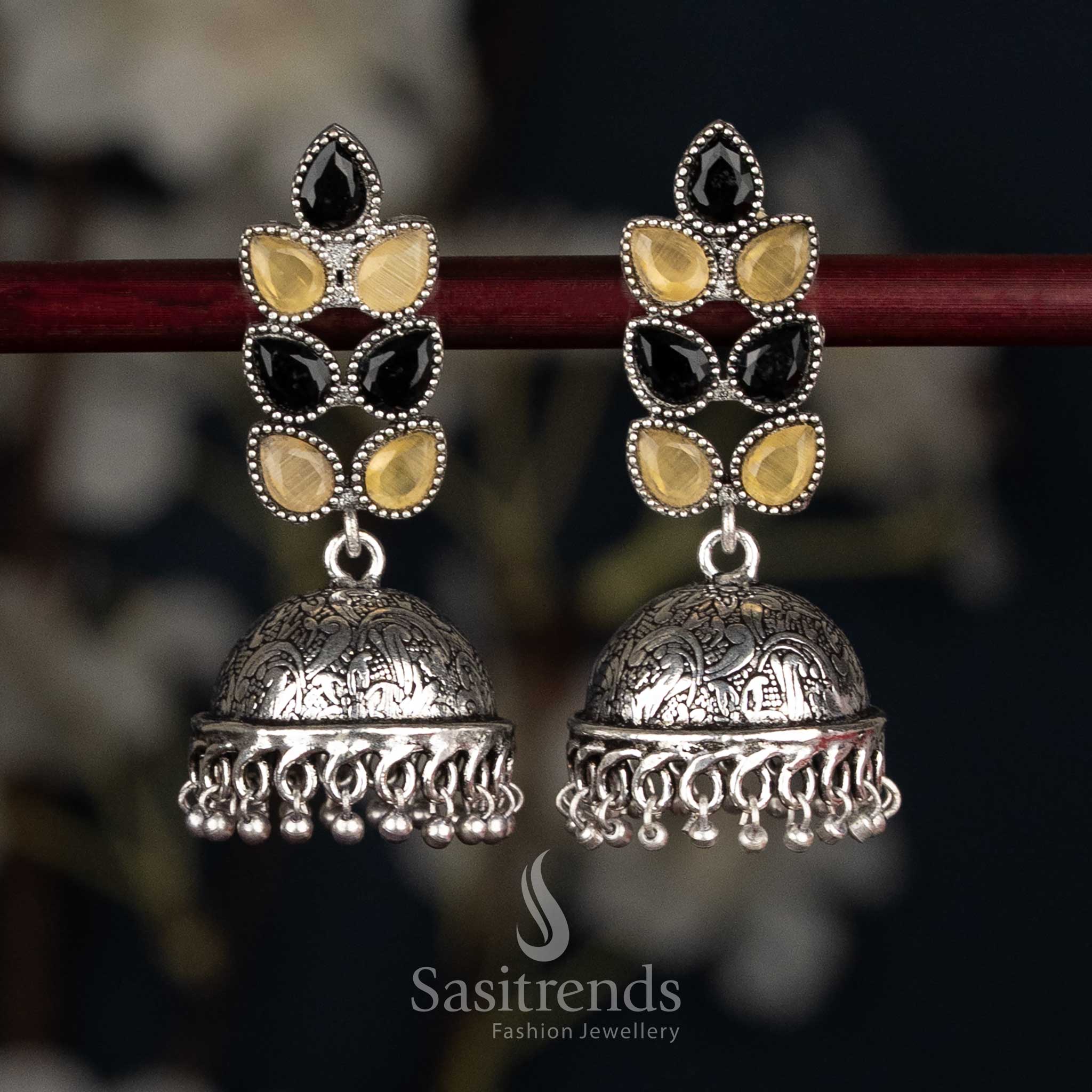 Striking black yellow oxidised petal cluster stud jhumka earrings with textured dome for festive styling - Sasitrends