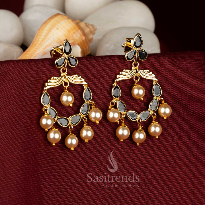 Kundan AD floral crescent earrings accented with pristine pearl detailing delivering dramatic sophistication for cocktail and cultural looks – Sasitrends