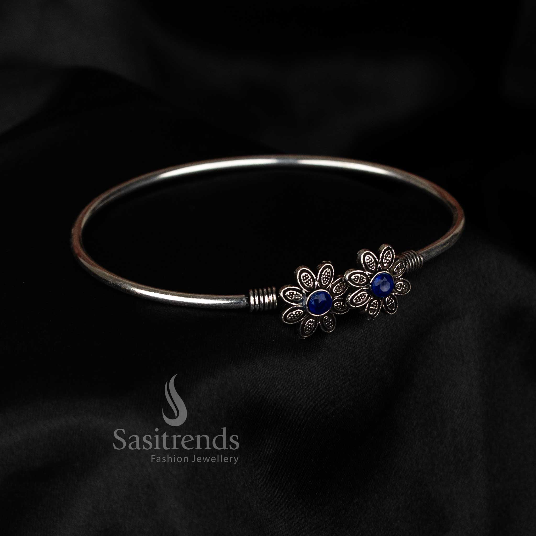 Oxidised blue dual motif floral stone bracelet with fancy festive wear styling for women – Sasitrends