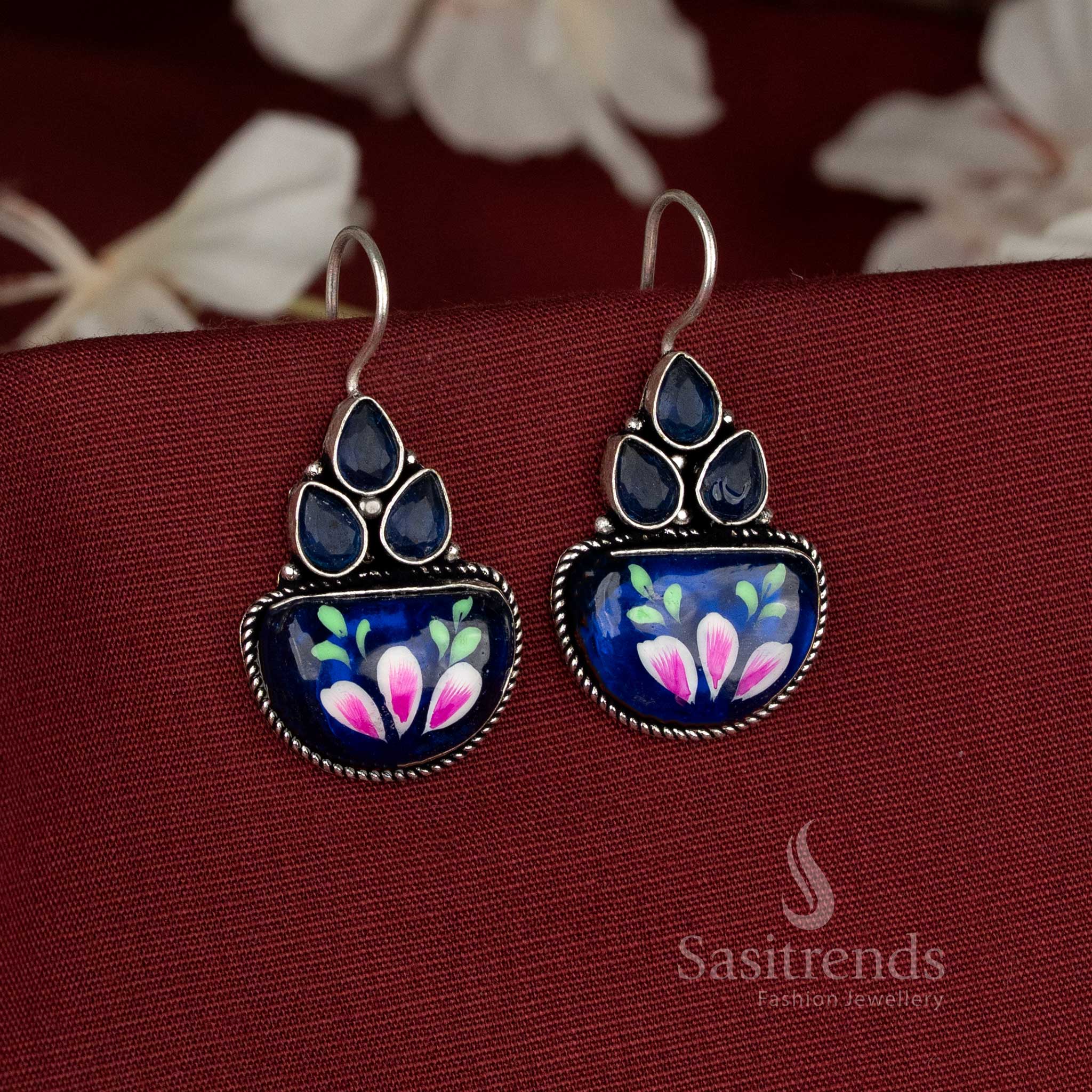 Ocean bloom oxidised earrings styled with blue Monalisa stones delivering vivid depth and graceful artistry – Sasitrends