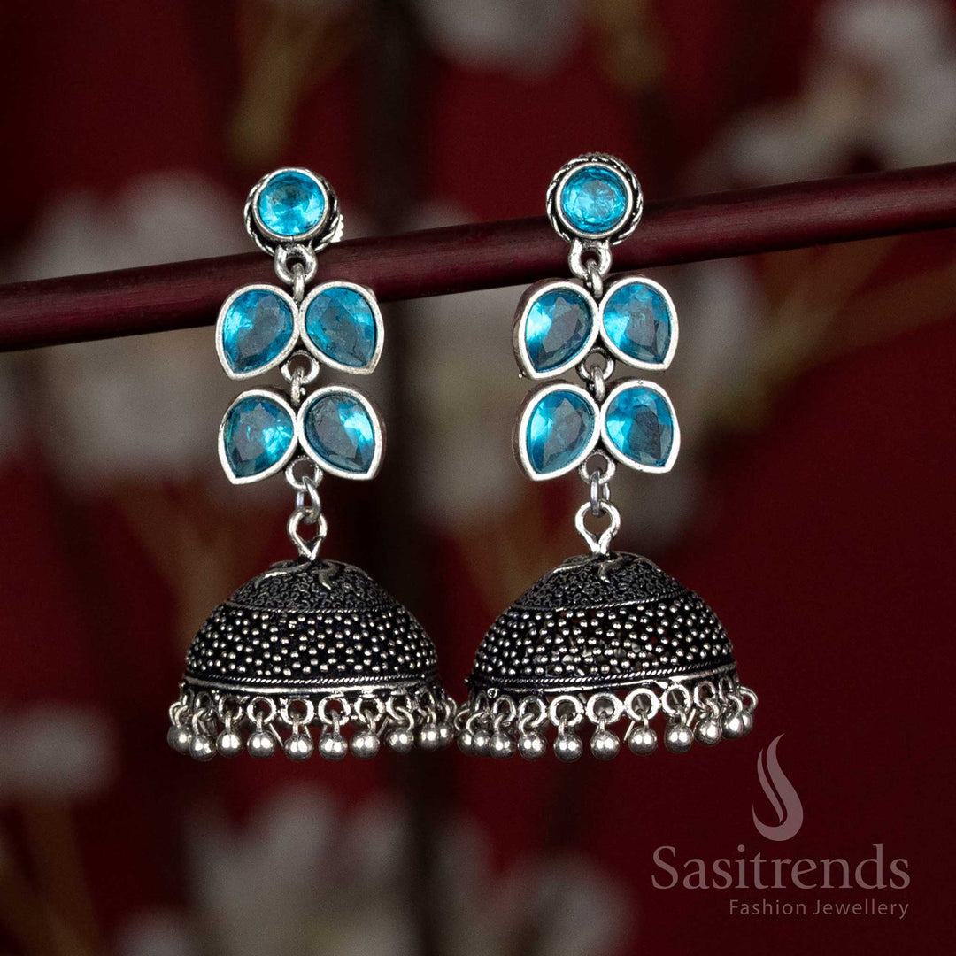 Breezy oxidised dome jhumka earrings with sky-blue floral cluster top – an elegant match for pastel-themed Navaratri mornings and dupatta sets – Sasitrends