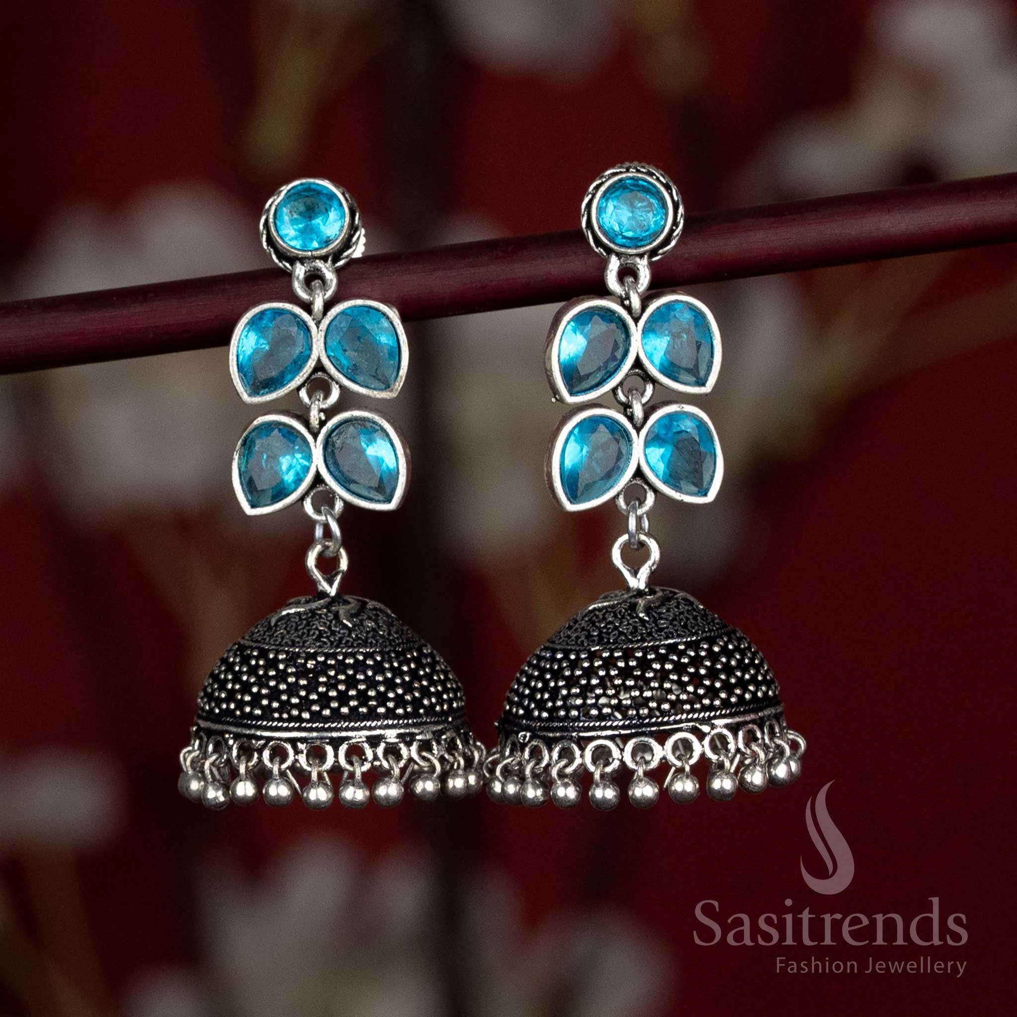 Breezy oxidised dome jhumka earrings with sky-blue floral cluster top – an elegant match for pastel-themed Navaratri mornings and dupatta sets – Sasitrends