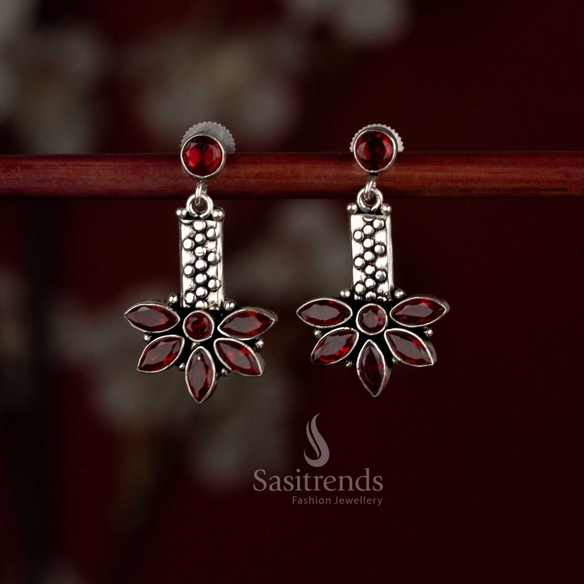 Crimson red oxidised silver dangler earrings featuring sculpted leaf drop and round detail – Sasitrends