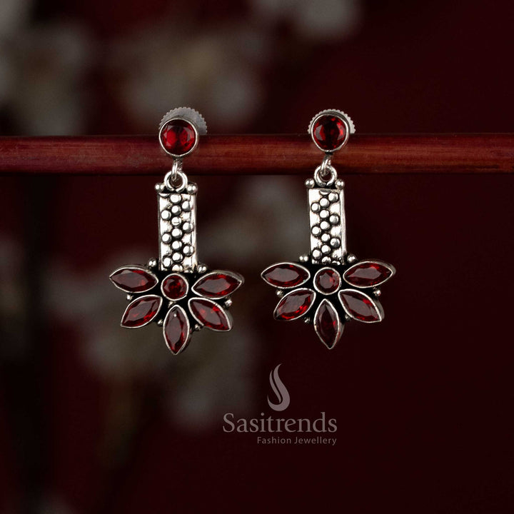 Crimson red oxidised silver dangler earrings featuring sculpted leaf drop and round detail – Sasitrends