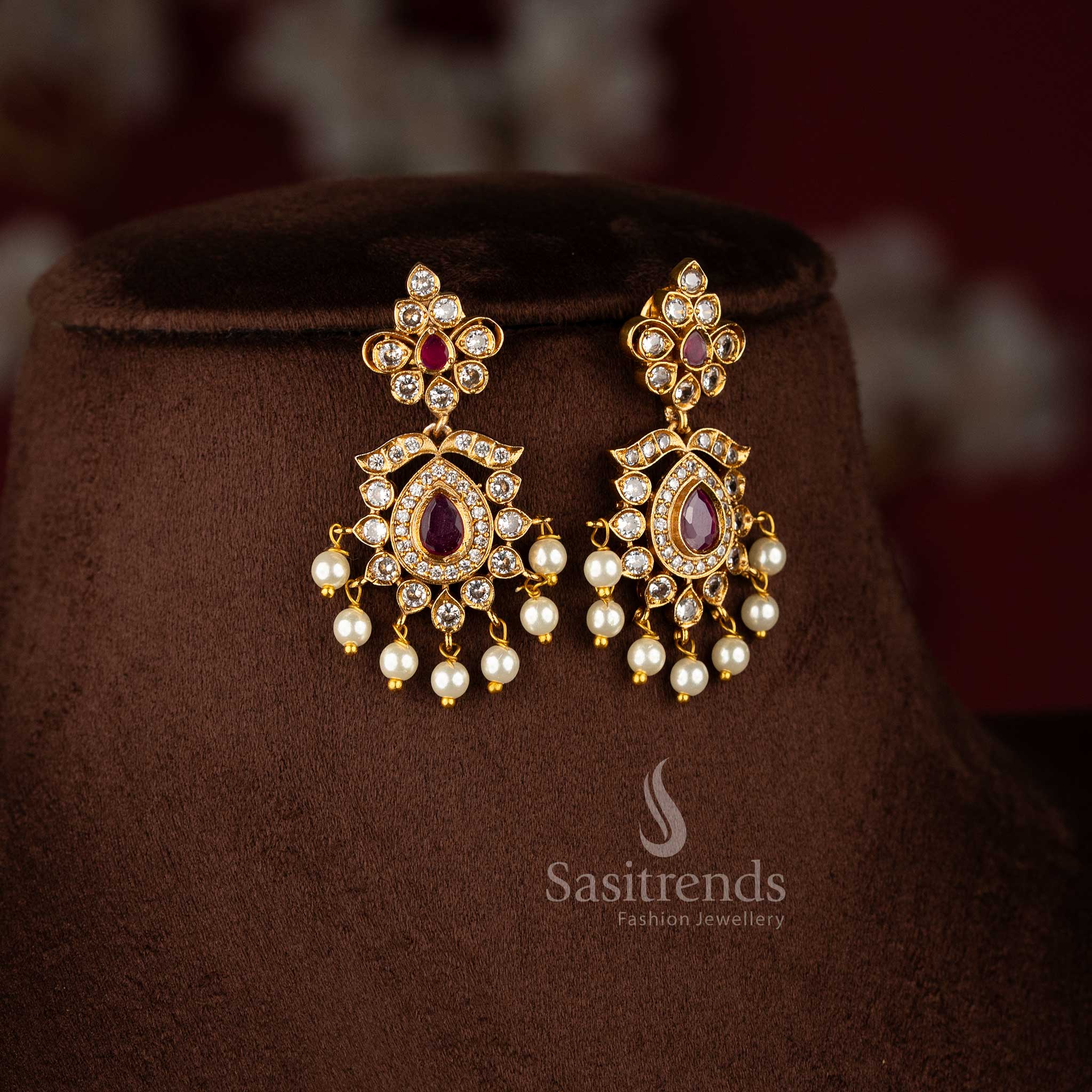 Regal white ruby traditional floral AD earrings with matte gold finish, beautiful ornament for celebrations - Sasitrends