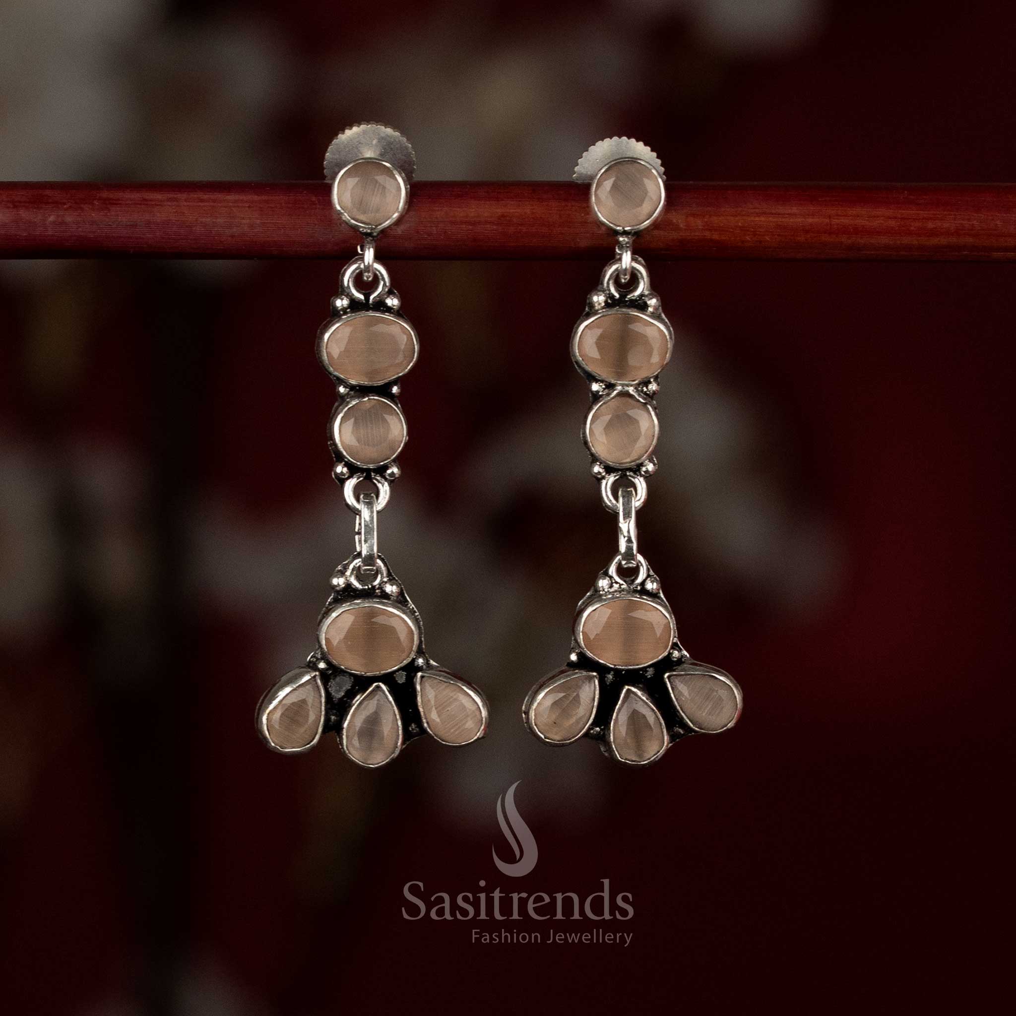 Brown oxidised silver earrings with warm-toned vertical floral fusion and cascading layered drops – Sasitrends