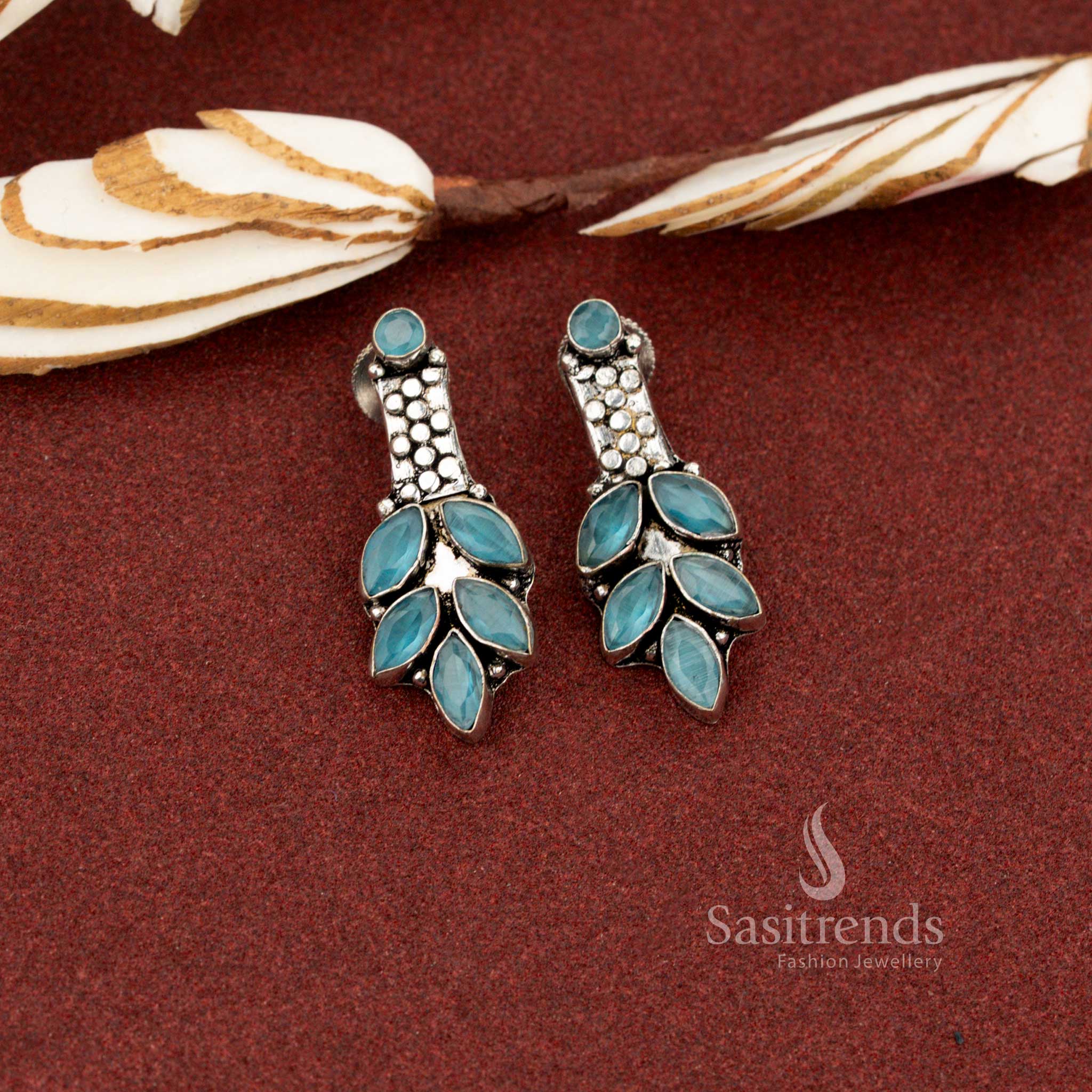 Calm sky blue oxidised marquise leaf cluster stone earrings ideal for soft office tones and balanced formal looks – Sasitrends