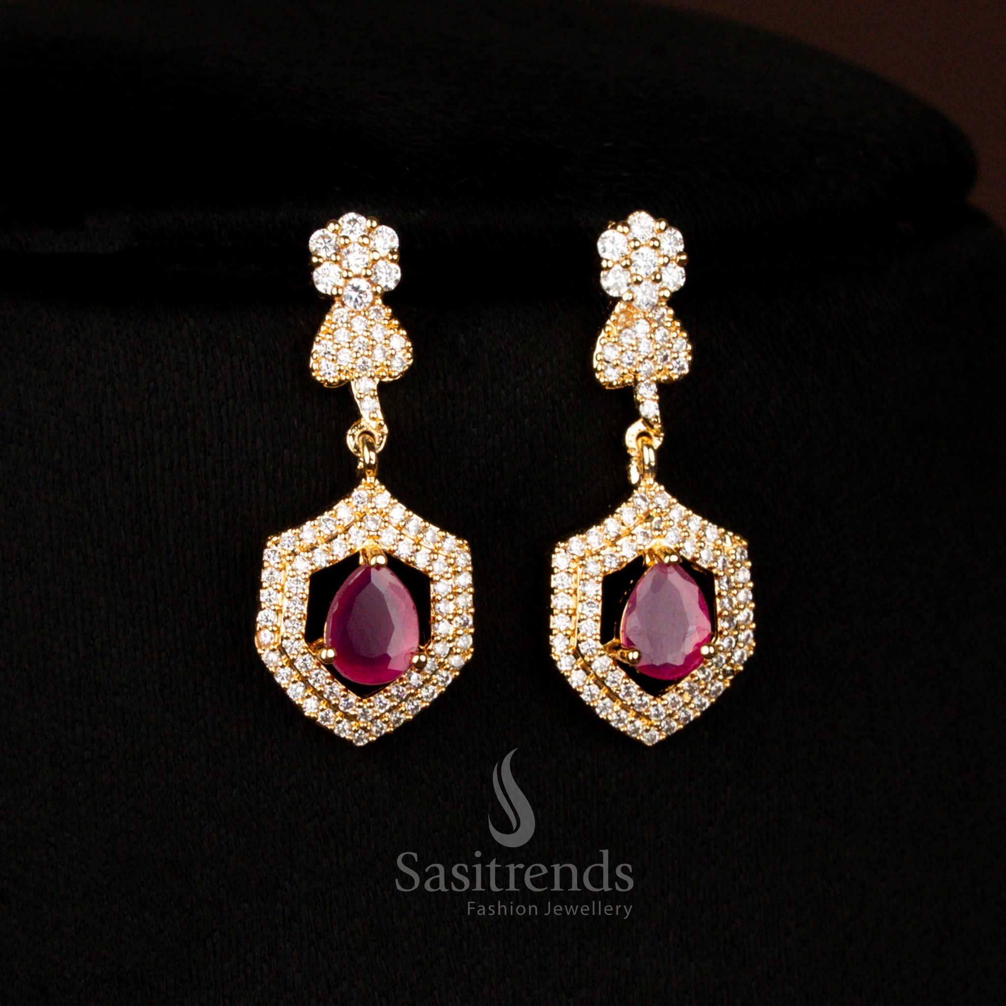 Stylish American Diamond gold plated heart and floral ruby earrings with teardrop stone pendant designed for special occasion wear – Sasitrends