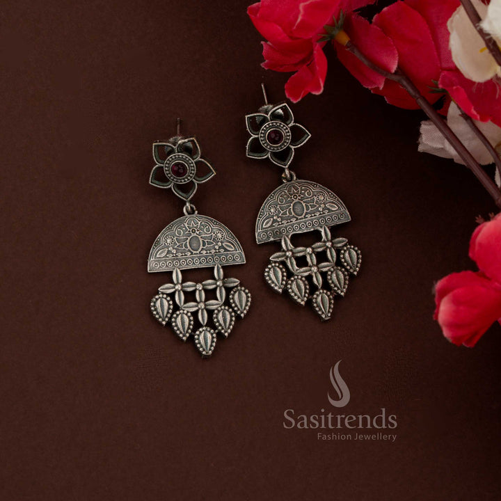 Elegant oxidised peacock drop earrings with golden floral accents in maroon combination suited for special occasions and evening celebrations – Sasitrends
