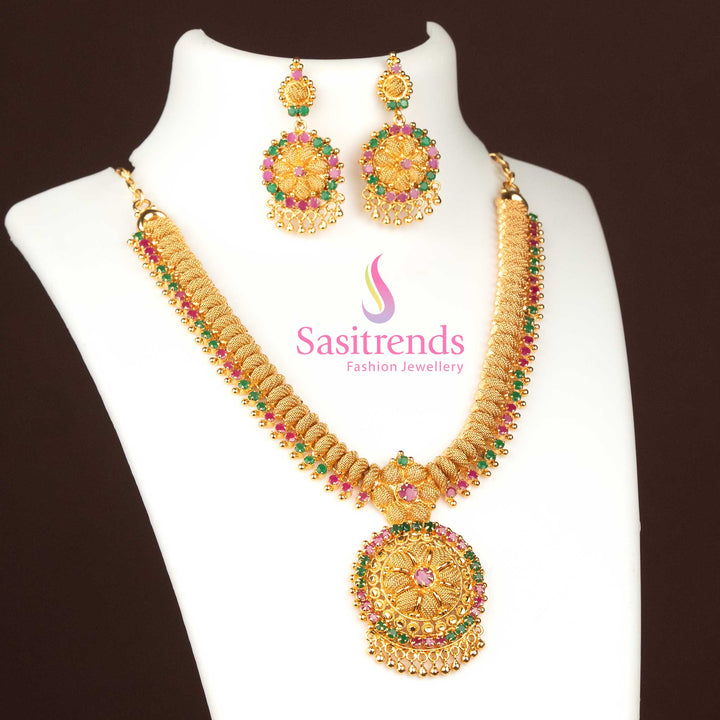 Dazzling ruby-green AD stones circular pendant necklace with matching earrings, micro gold plated and adorned with golden beads for premium festive radiance – Sasitrends