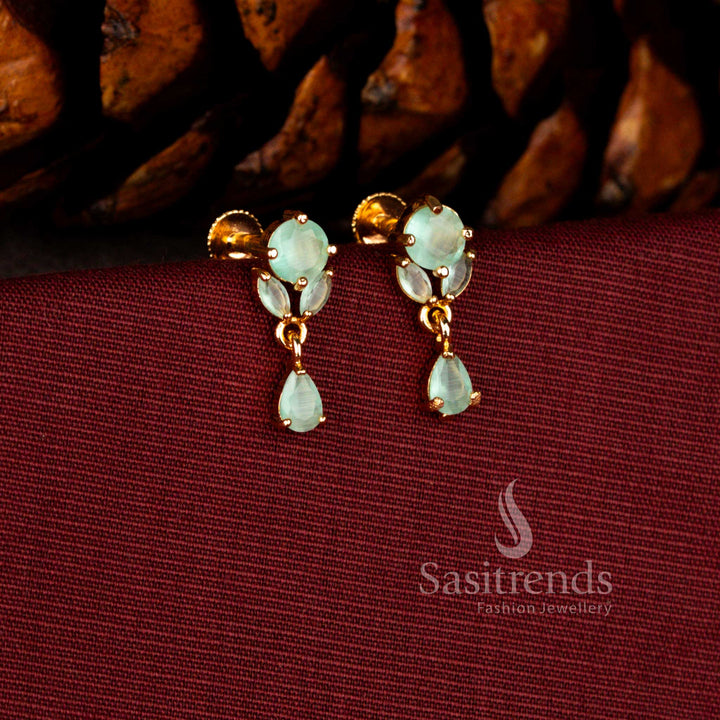 Majestic gold look earrings in mint crafted with round floral AD pattern and radiant brilliant cut teardrop detail – Sasitrends