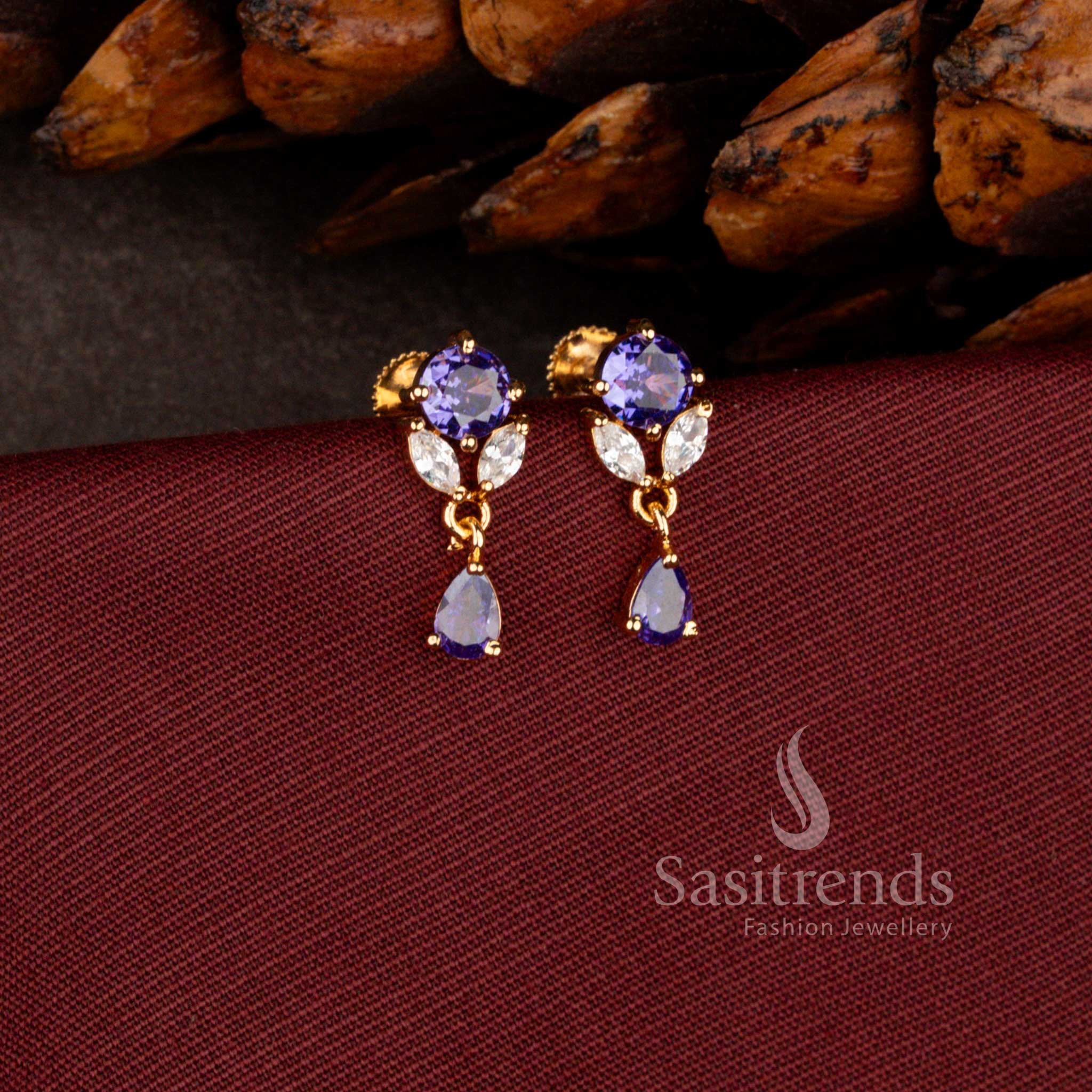 Majestic gold look earrings in mint crafted with round floral AD pattern and radiant brilliant cut teardrop detail – Sasitrends