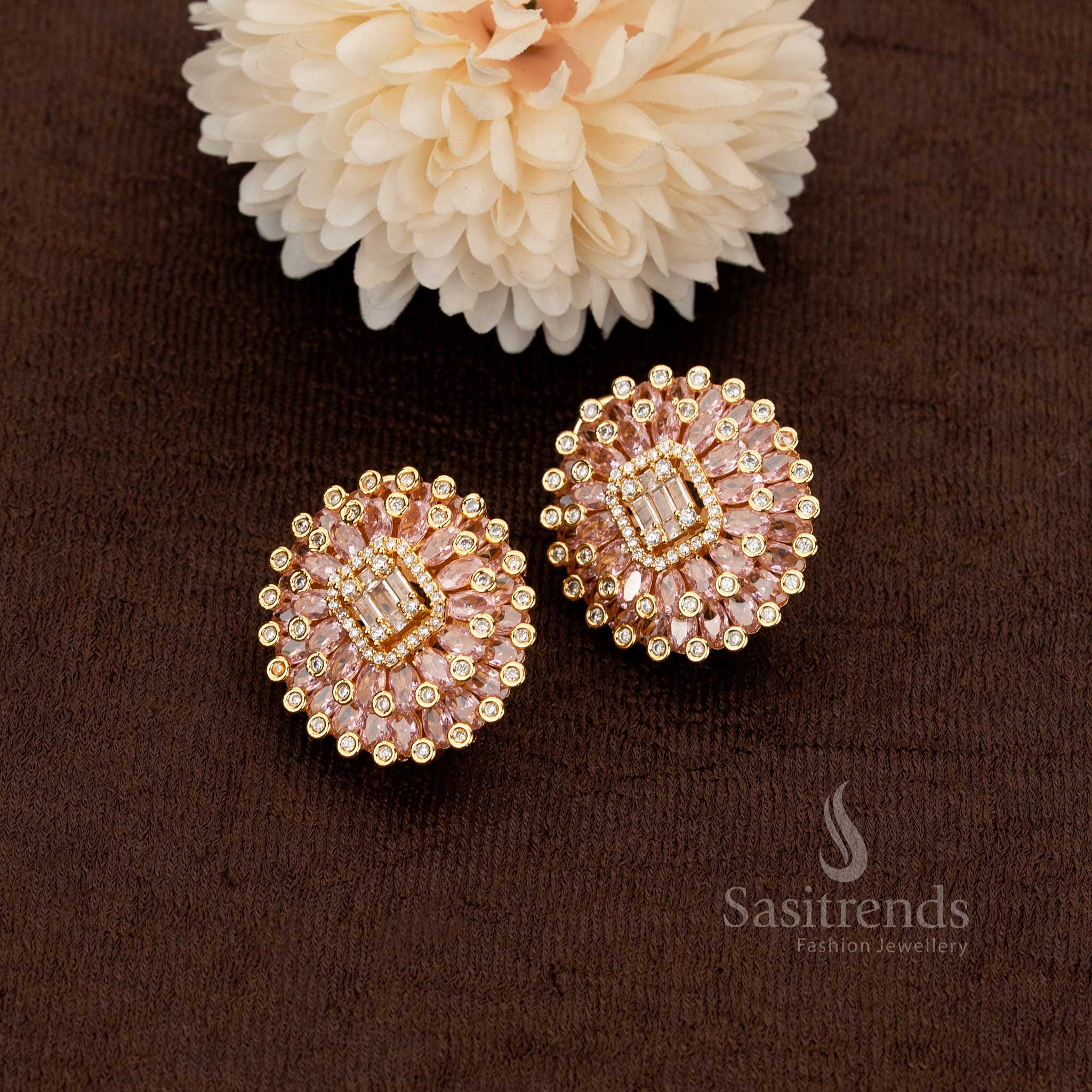 Charming American diamond gold plated floral stud earrings adorned with delicate pink stones – a graceful choice for weddings, receptions, and grand festivities – Sasitrends