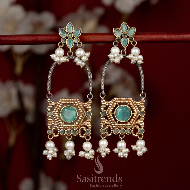 Sophisticated antique oxidised silver earrings featuring mint Monalisa stones, layered floral arch motifs and pearl cluster hangings for refined ethnic wear - Sasitrends