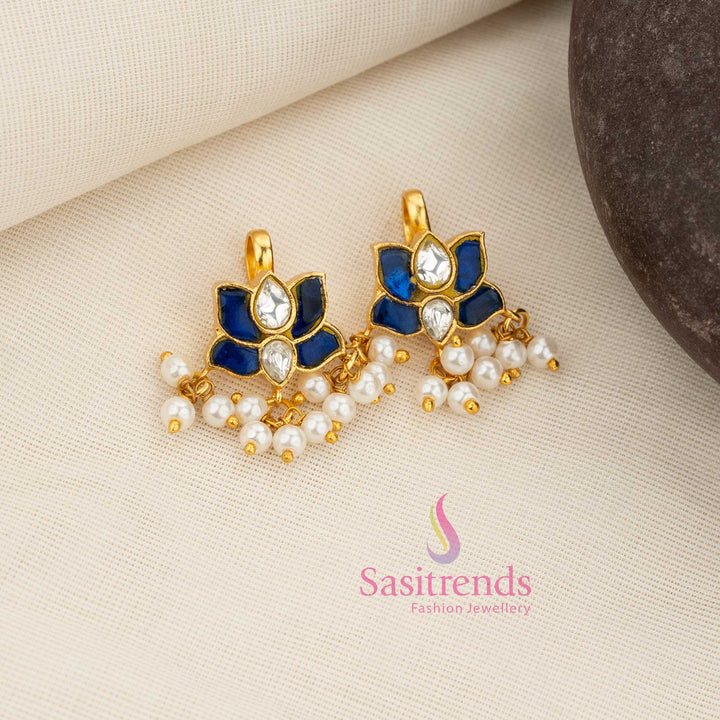 Serene white-blue Kundan lotus motif bugadi earcuff with pearl drops perfect for festive and cultural traditional jewellery styling – Sasitrends