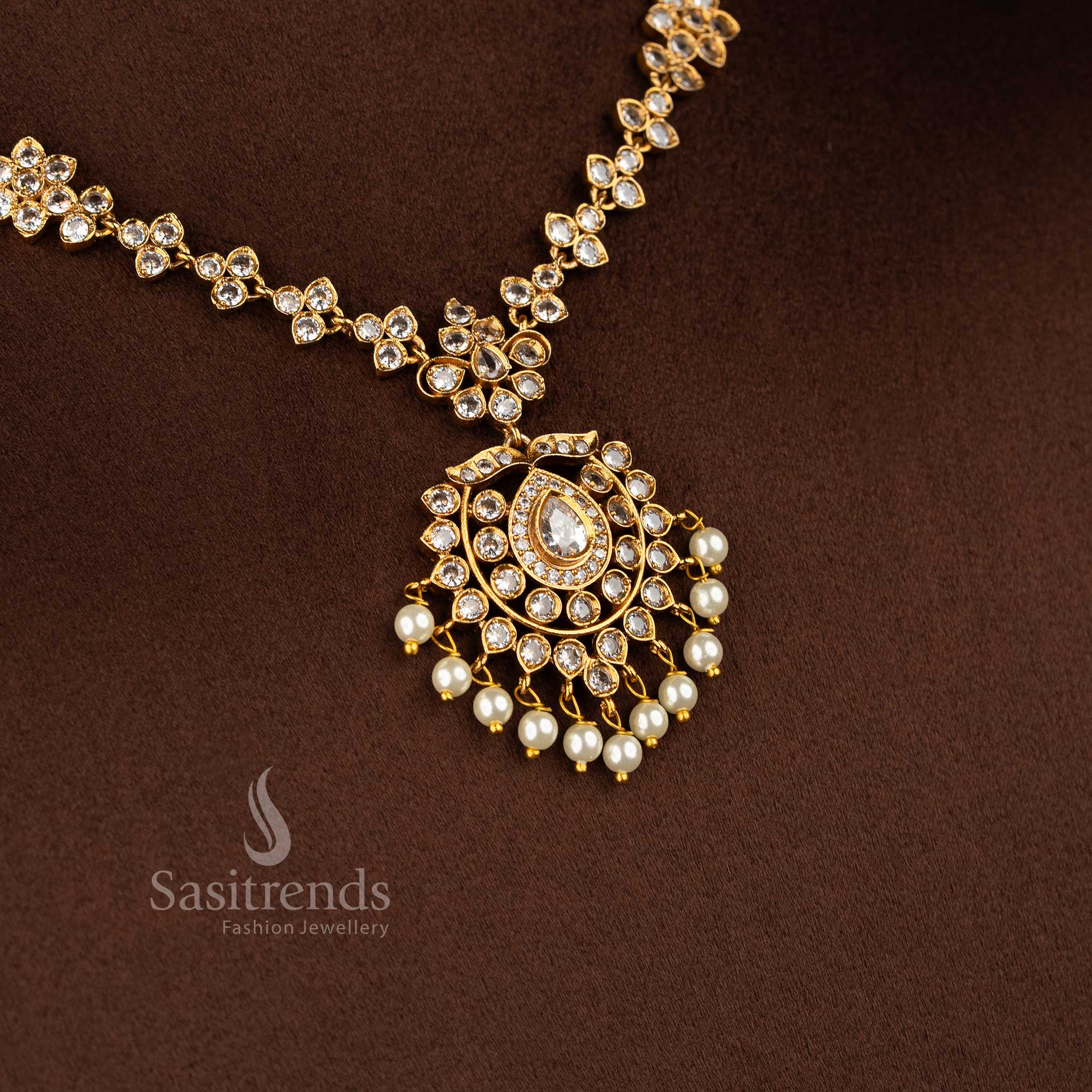 Elegant white matte gold flower AD necklace set, beautiful jewellery for festive and bridal saree wear - Sasitrends