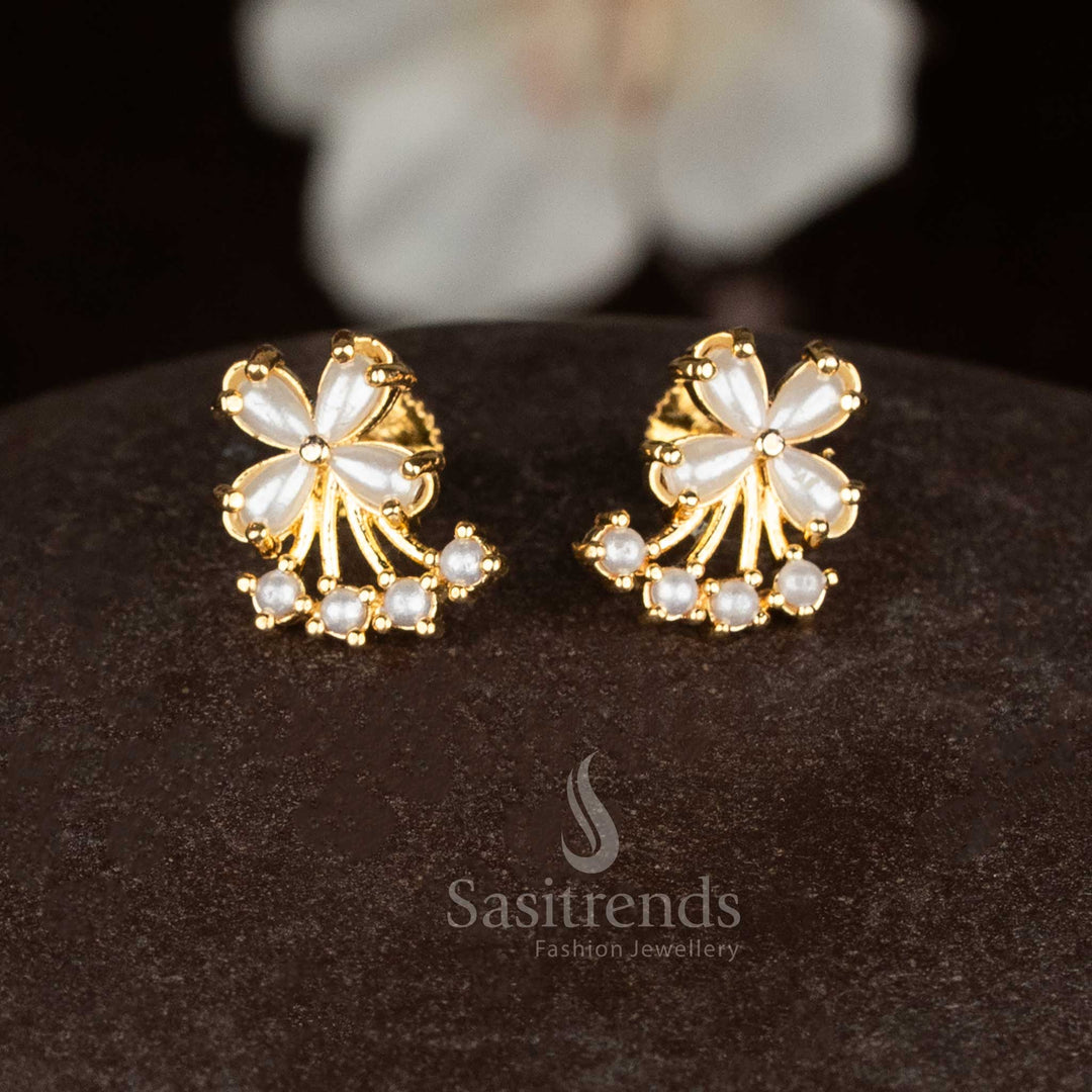 Graceful micro gold four petal butterfly studs with pearl details for ethnic and ceremonial looks - Sasitrends