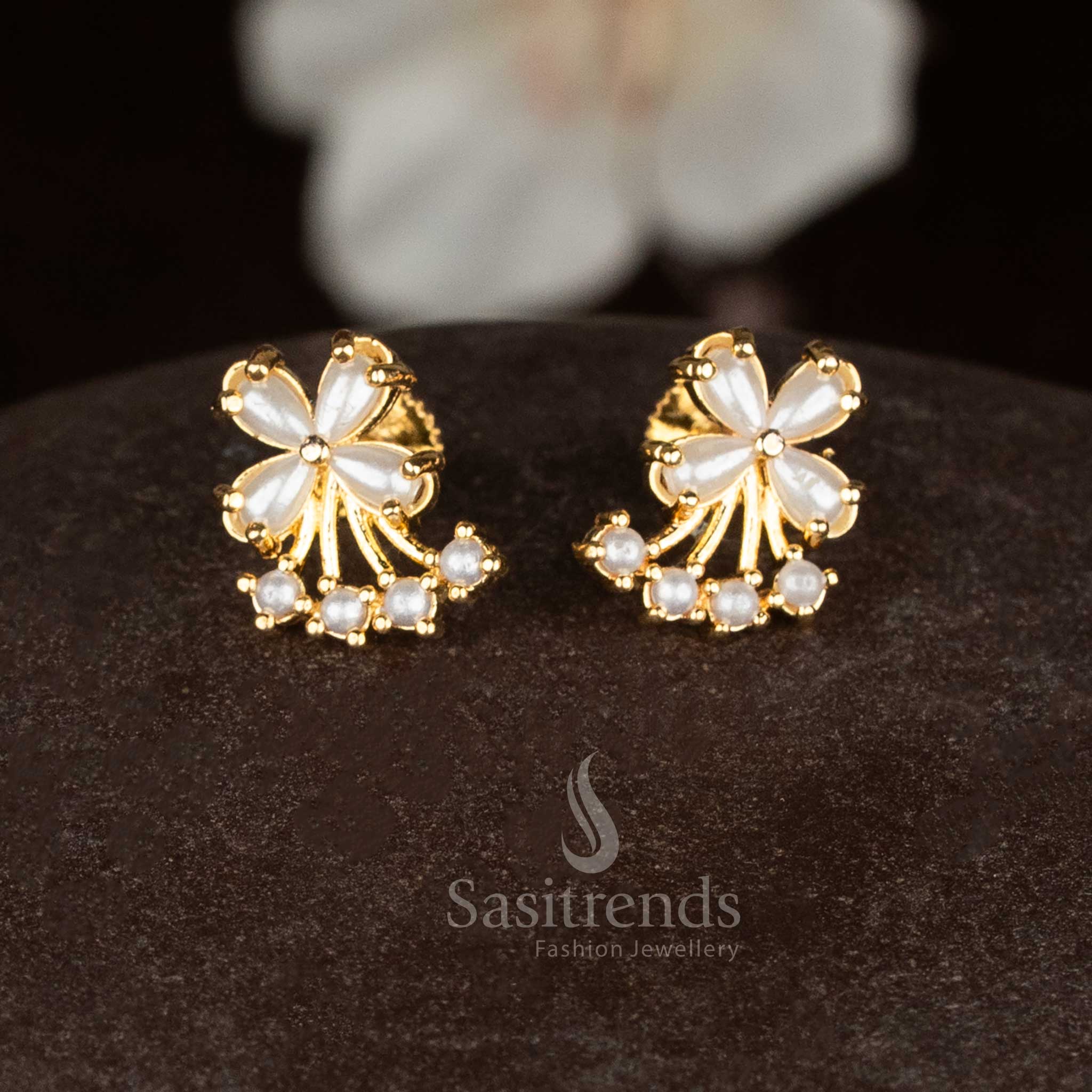 Graceful micro gold four petal butterfly studs with pearl details for ethnic and ceremonial looks - Sasitrends