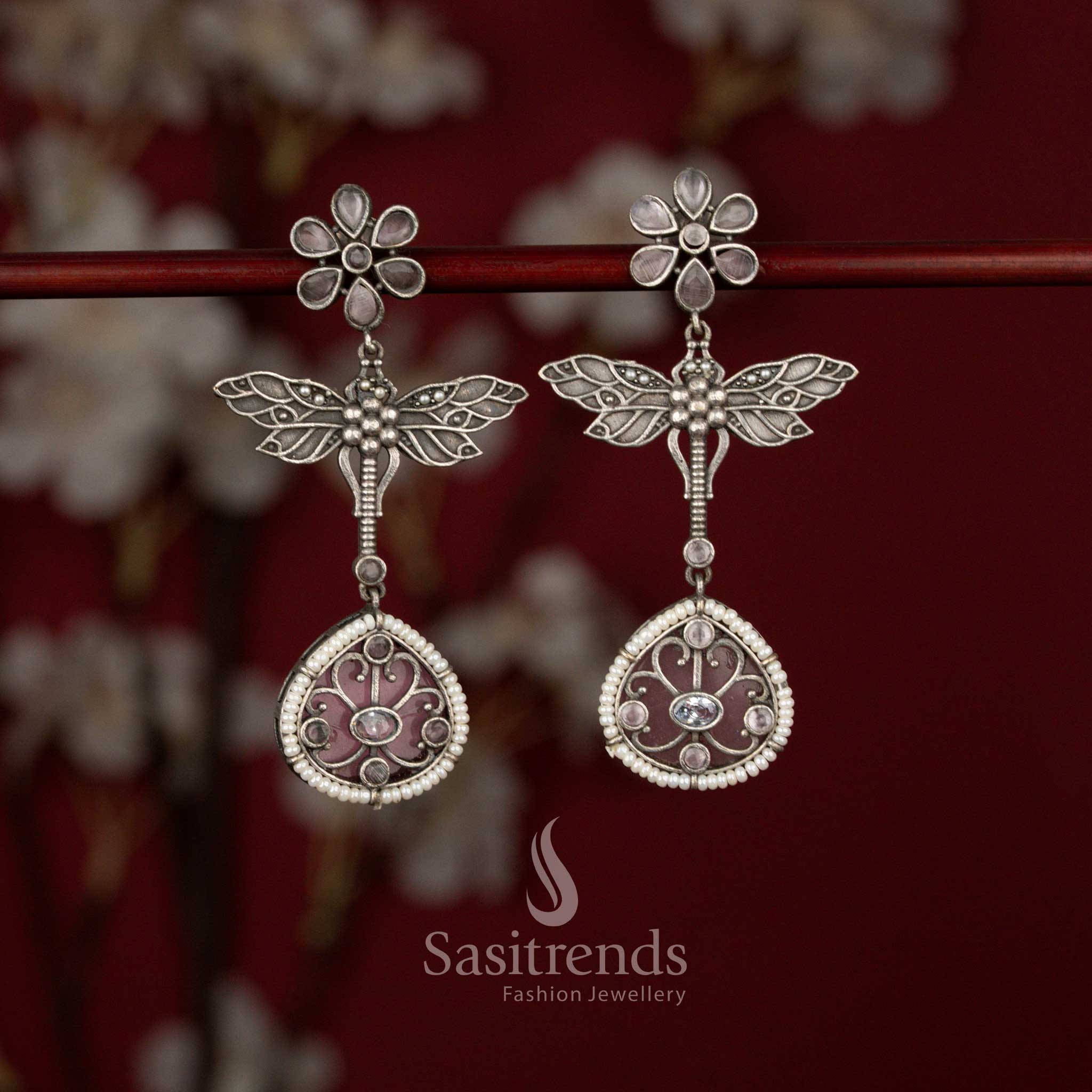 Beautiful Antique Oxidised 6-Petal Floral Dragonfly Wings Teardrop Earrings with Pearl Accents for Navarathri Wear - Sasitrends
