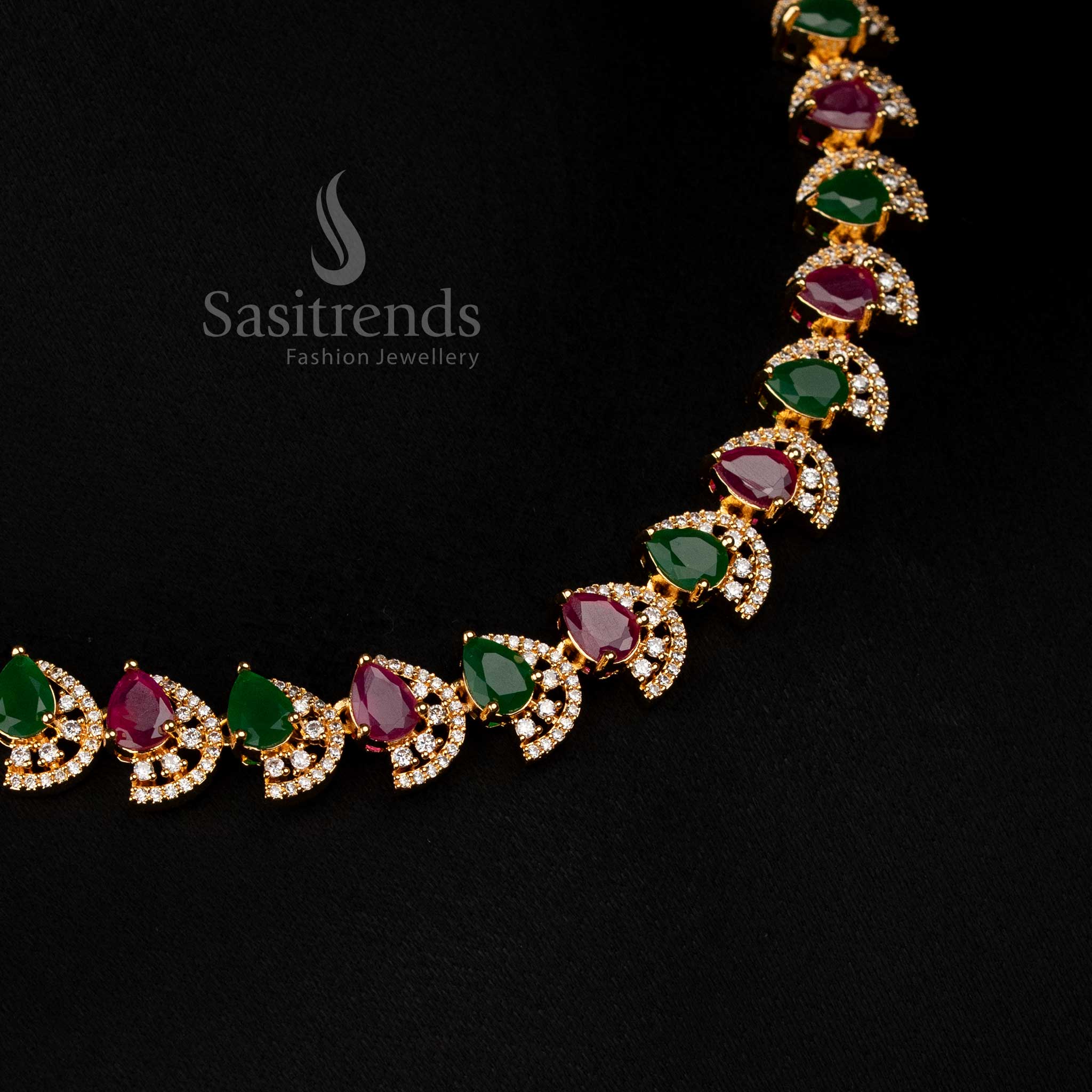 Glamorous ruby green gold plated teardrop infinity necklace with sparkling AD stones for elegant events - Sasitrends