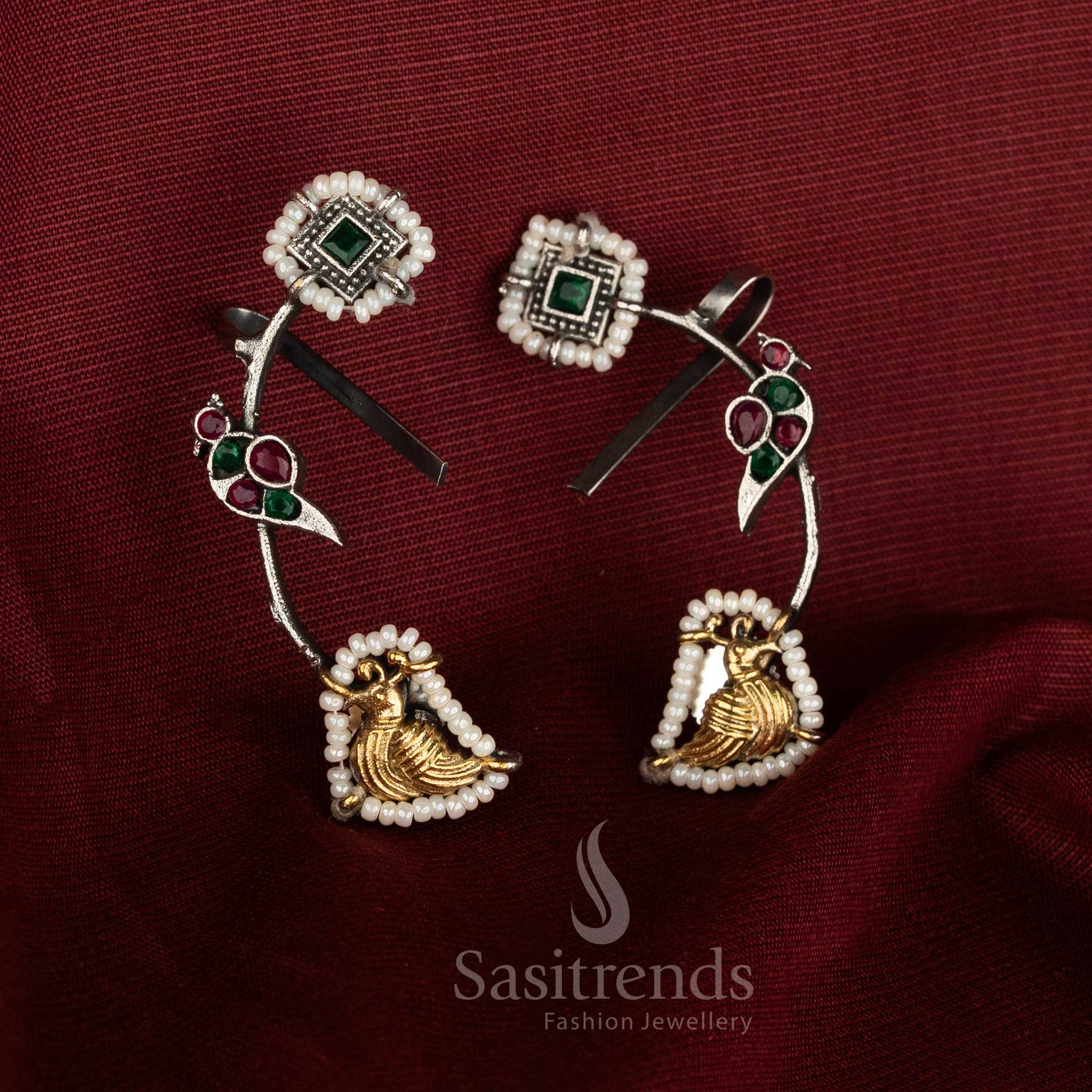 Sacred fusion oxidised silver dual tone ruby green peacock stone ear cuffs with cultural splendour jewellery - Sasitrends