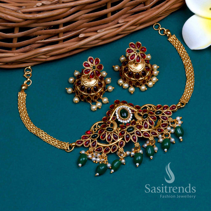 Classic emerald plume matte gold plated green-pearl stone studded floral peacock choker jewellery set with graceful pearl detailing for festive and function wear – Sasitrends