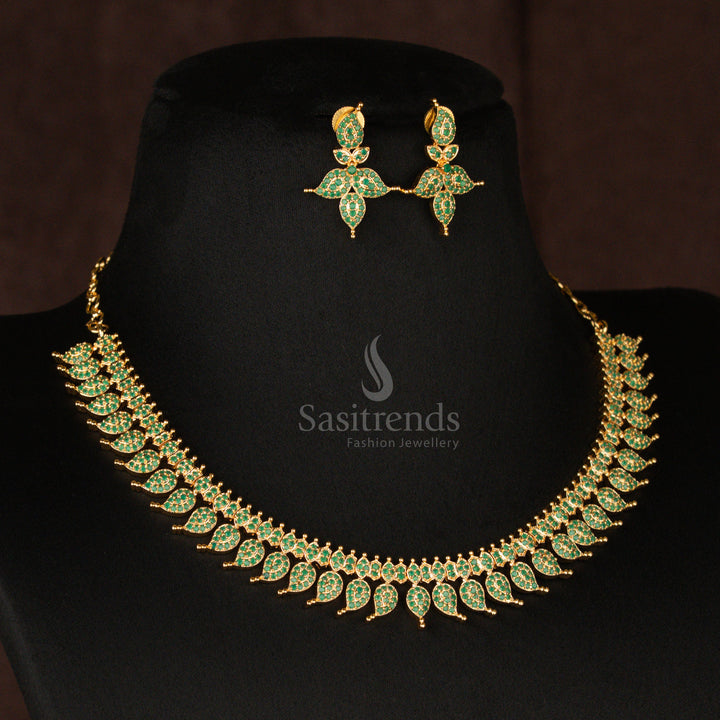 Gorgeous emerald-green stone American Diamond micro gold plated short haram necklace set, designed in a vintage traditional jewellery style for an elegant ethnic appeal - Sasitrends