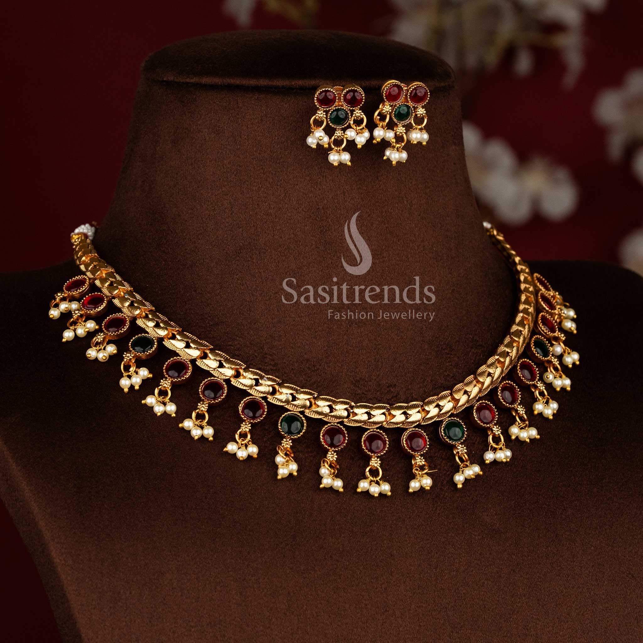 Classic matte gold plated temple necklace with ruby green round stone pendant and pearl drops for saree and ethnic styling - Sasitrends