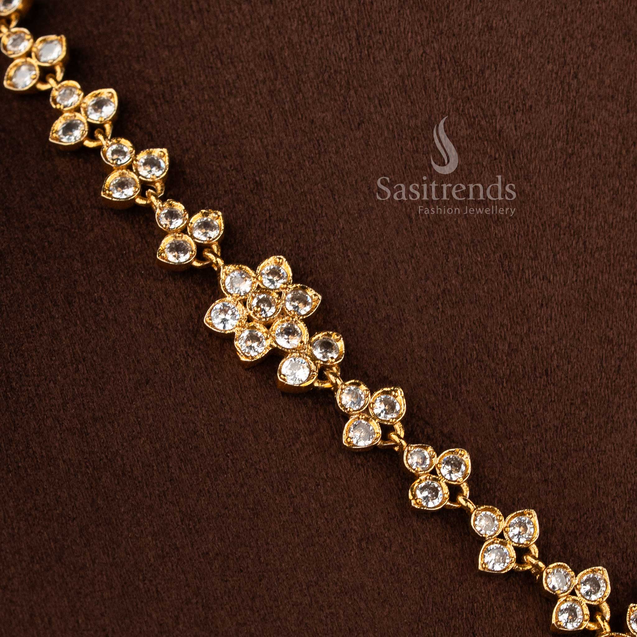 Graceful white matte gold floral AD necklace jewellery set for women, elegant accessory for festive saree styling - Sasitrends