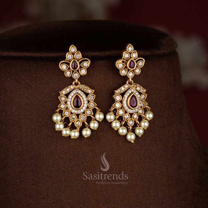 Sacred white ruby temple matte gold plated chandbali floral muthu maala pearl earrings suited for pooja wear and devotional occasions – Sasitrends