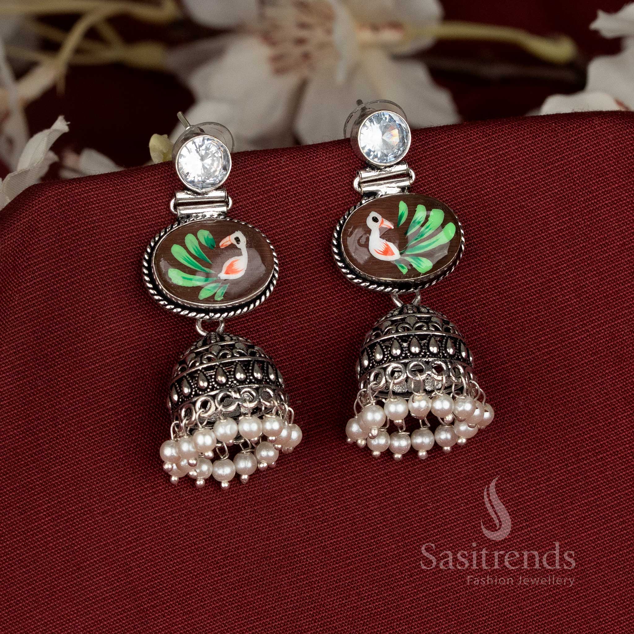 Earthy hand-painted oxidised brown Monalisa oval stone jhumka earrings designed for Navaratri and festive occasions – Sasitrends