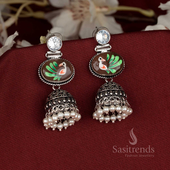 Earthy hand-painted oxidised brown Monalisa oval stone jhumka earrings designed for Navaratri and festive occasions – Sasitrends