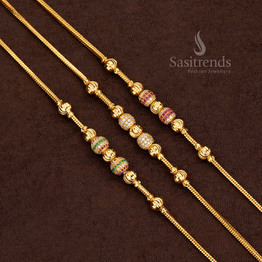 Multi-coloured stones bring life to a gleaming gold plated mugappu chain accented with golden beads – Sasitrends