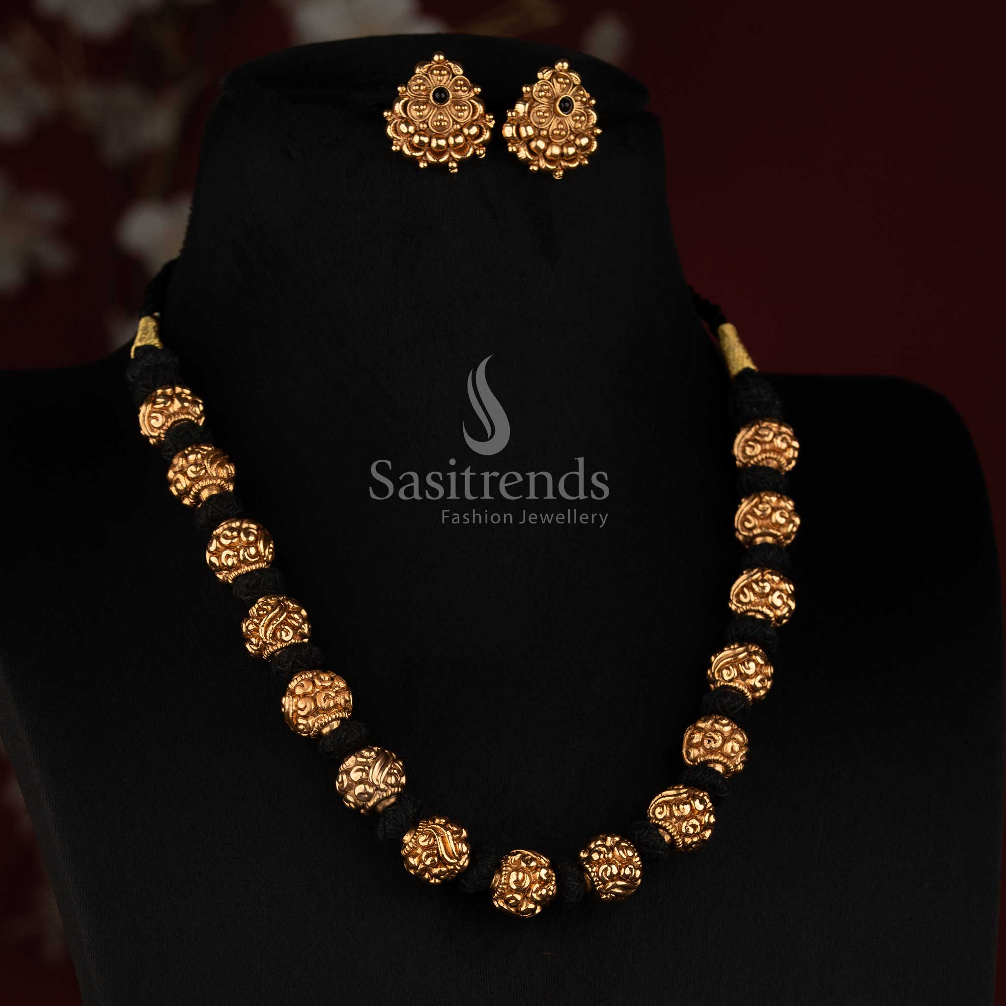 Antique Gola Plated Ornate Round Golden Beads Thread Mala Necklace Set with Floral Round Stud Earrings