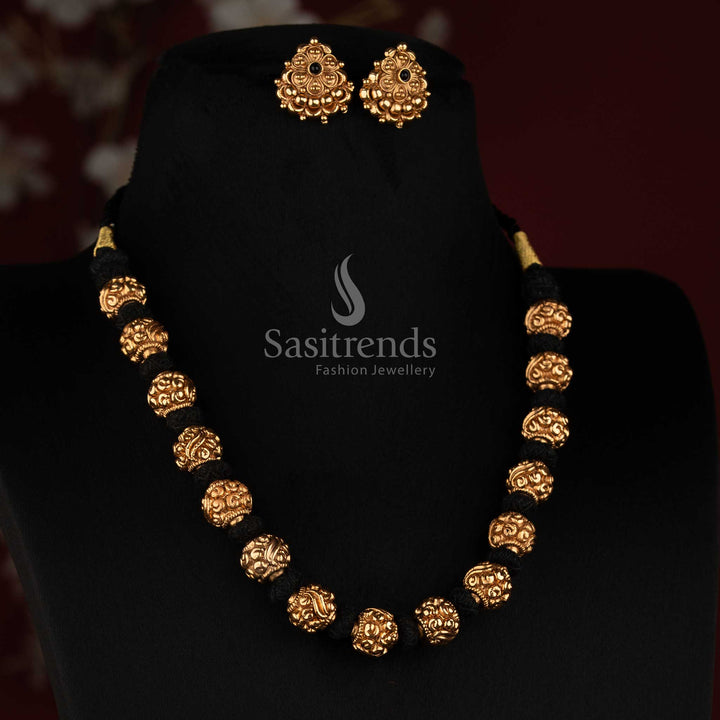 Antique Gola Plated Ornate Round Golden Beads Thread Mala Necklace Set with Floral Round Stud Earrings