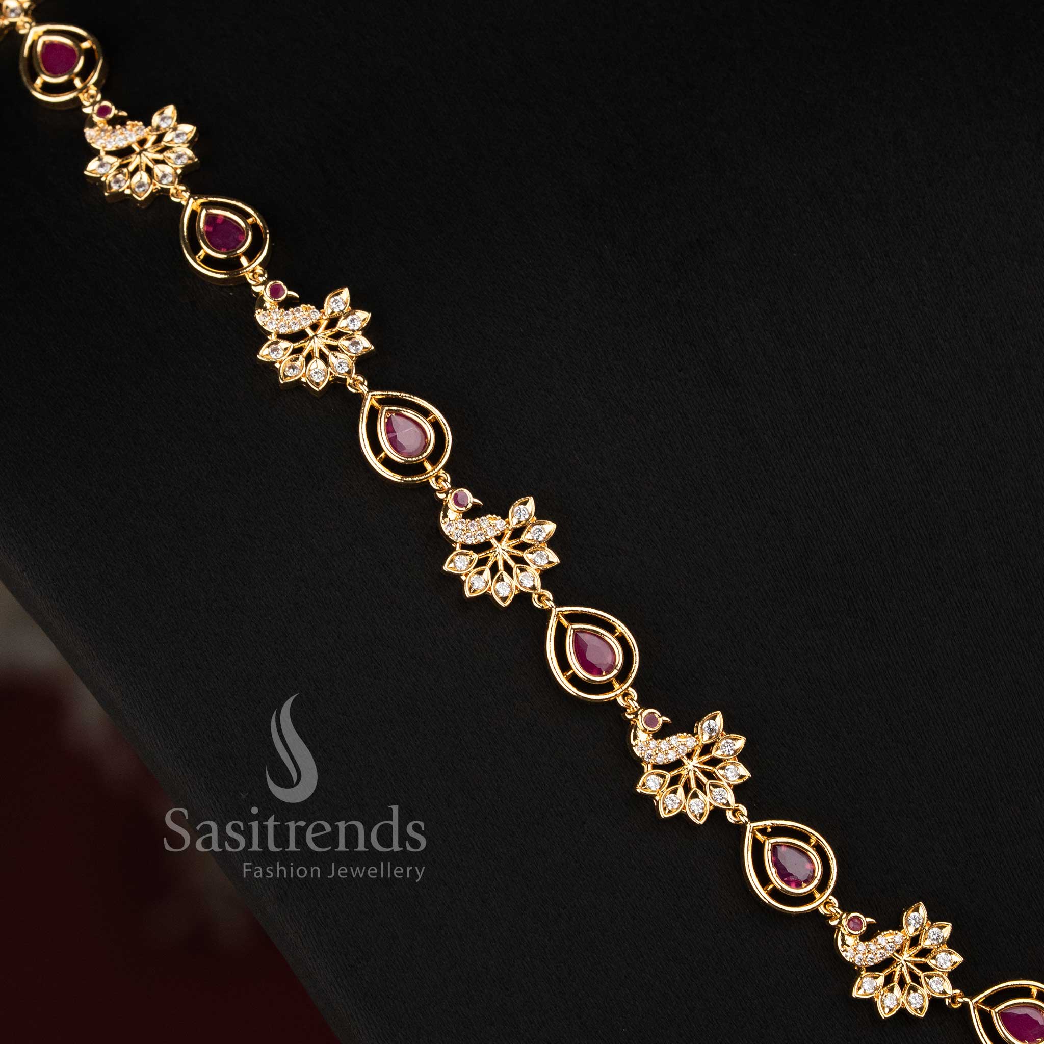Sasitrends Pachaloha jewellery set with an elegant floral necklace structure, detailed AD stone work, pear-shaped motifs and matching earrings 