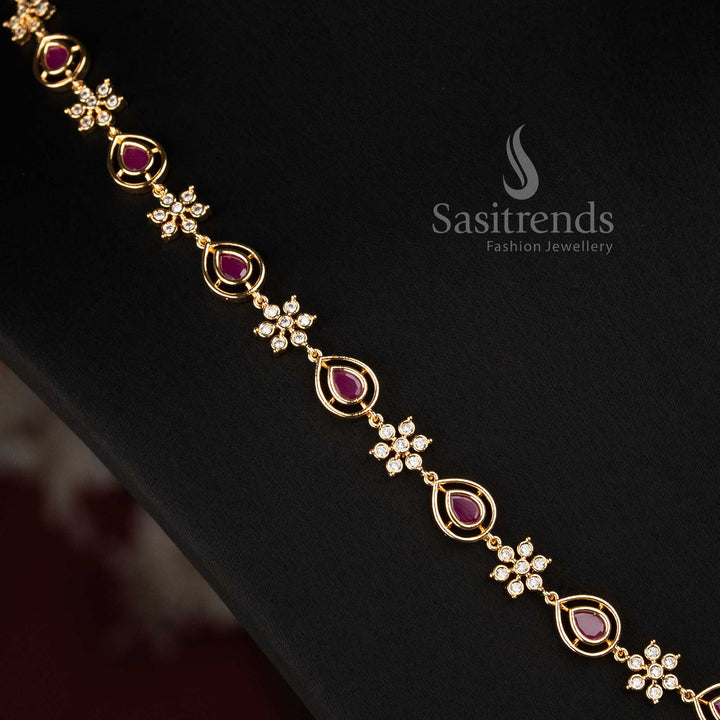 Sasitrends micro gold plated AD stone necklace set designed with floral clusters, rounded frames, pear-shaped elements and coordinated earrings 