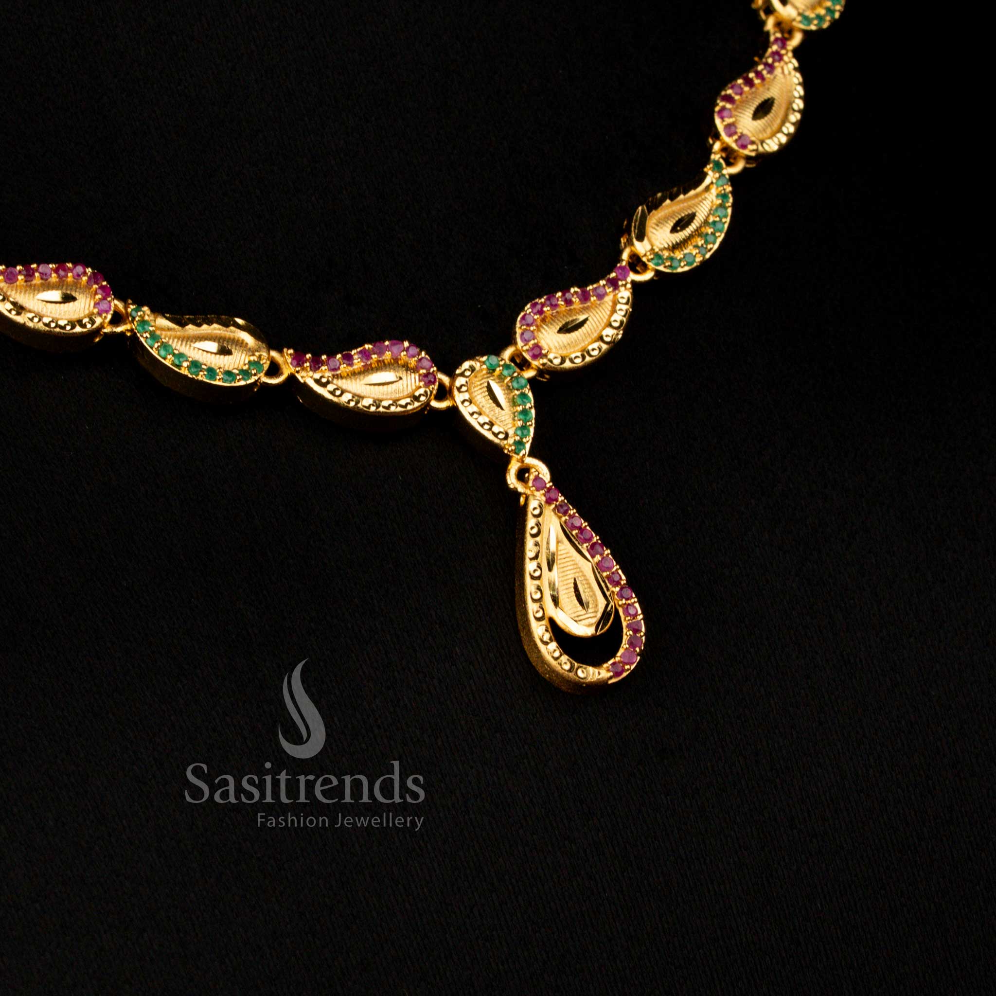 Stunning Paisley necklace forming Micro Gold Plated design, adorned with glittering ruby-green stones for elegant festive charm – Sasitrends