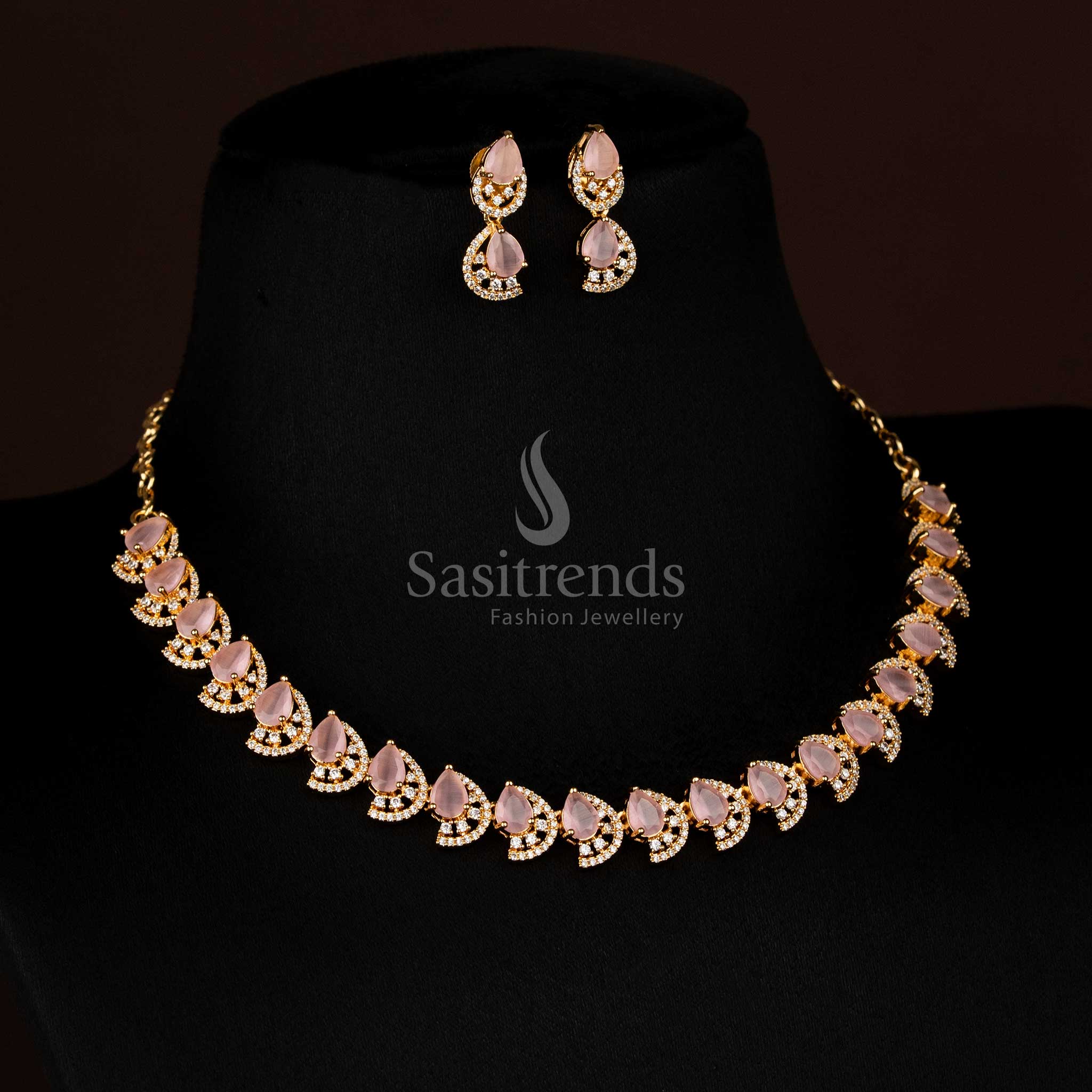 Gorgeous pink gold plated infinity teardrop necklace set with American diamonds for festive occasions - Sasitrends
