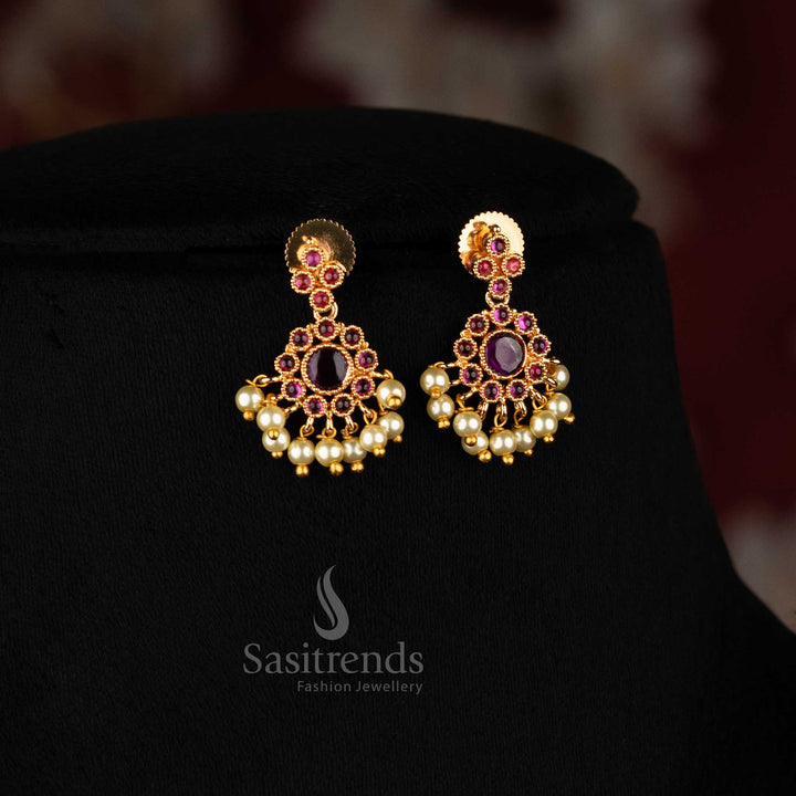 Festive ruby micro gold plated floral pearl drop earrings featuring sparkling AD accents, perfect accessory for traditional weddings and cultural celebrations - Sasitrends