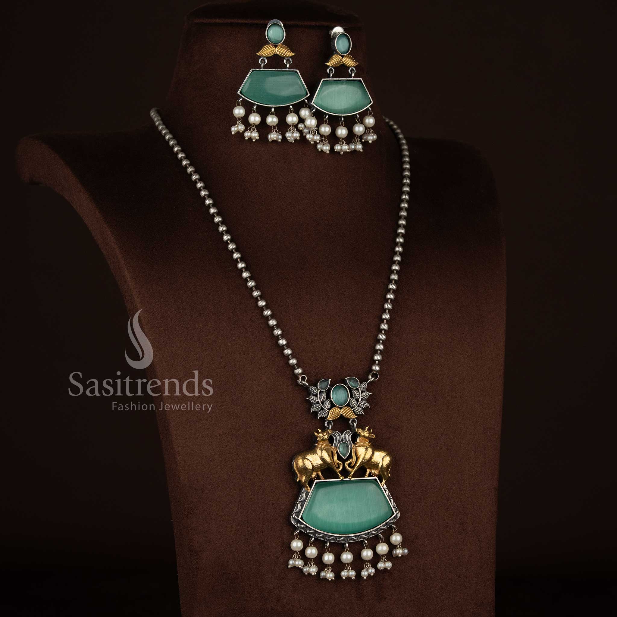 Radiant Antique Oxidised 92.5 Silver Plated Dual Tone Pichwai Cow Leaf Statement Necklace Set with Trapezoid Stones Pearl for temple occasions Sasitrends
