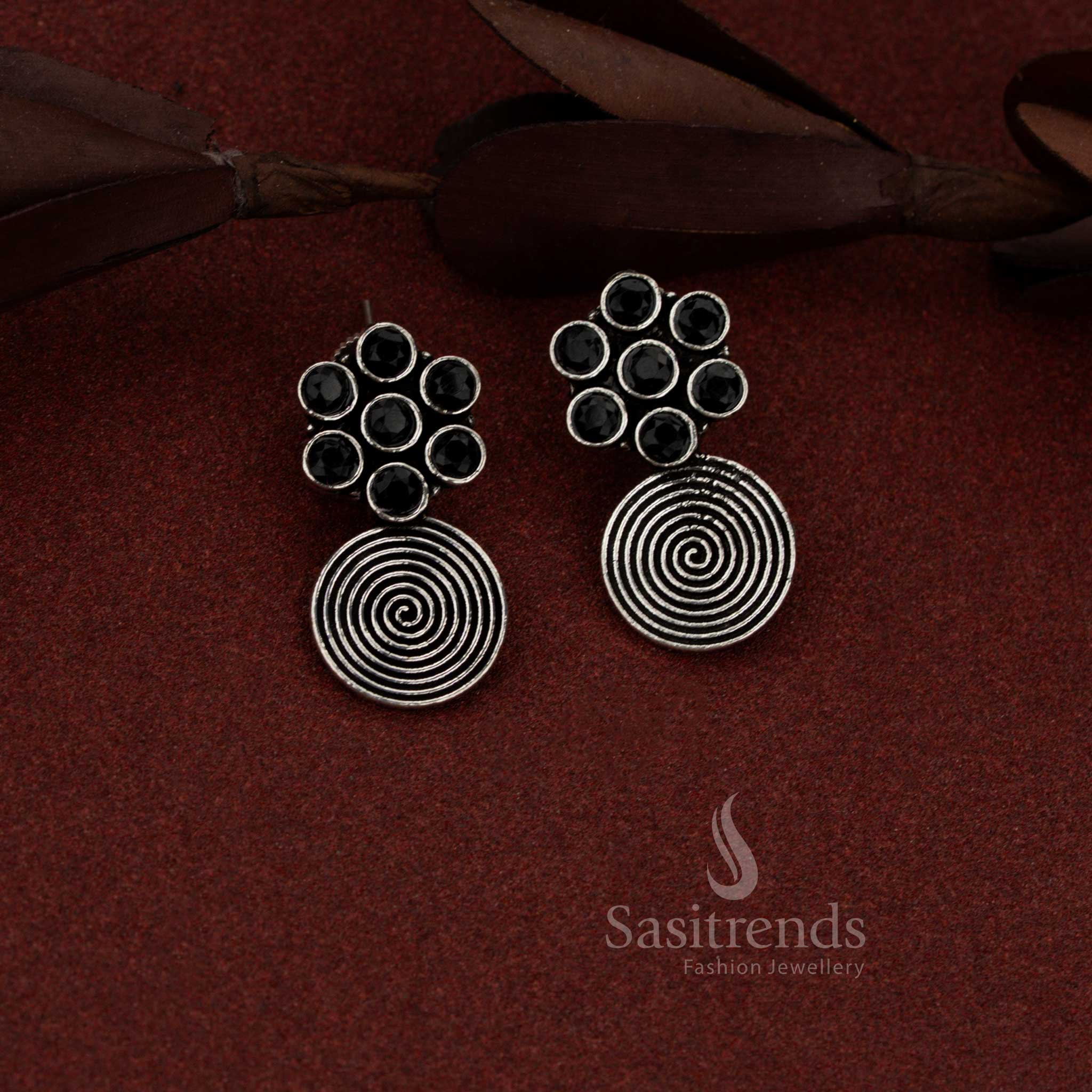 Bold oxidised silver floral spiral dangler earrings in black tone perfect for evening wear and smart casual outfits – Sasitrends