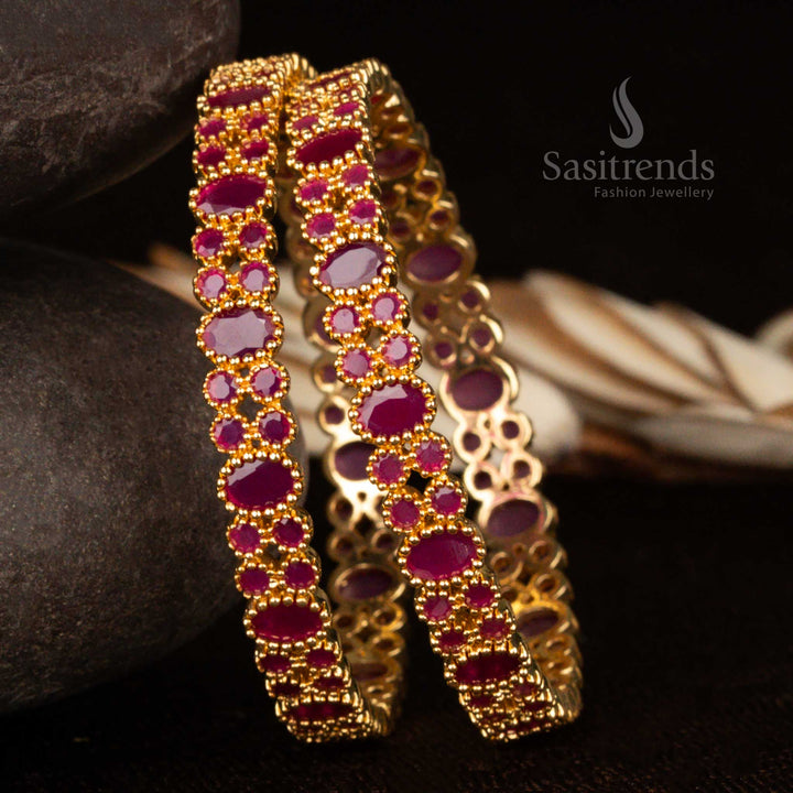Ruby CZ bangles set in micro gold finish with glimmering stones – an ideal jewellery piece for grand occasions and heritage-inspired bridal styling by Sasitrends