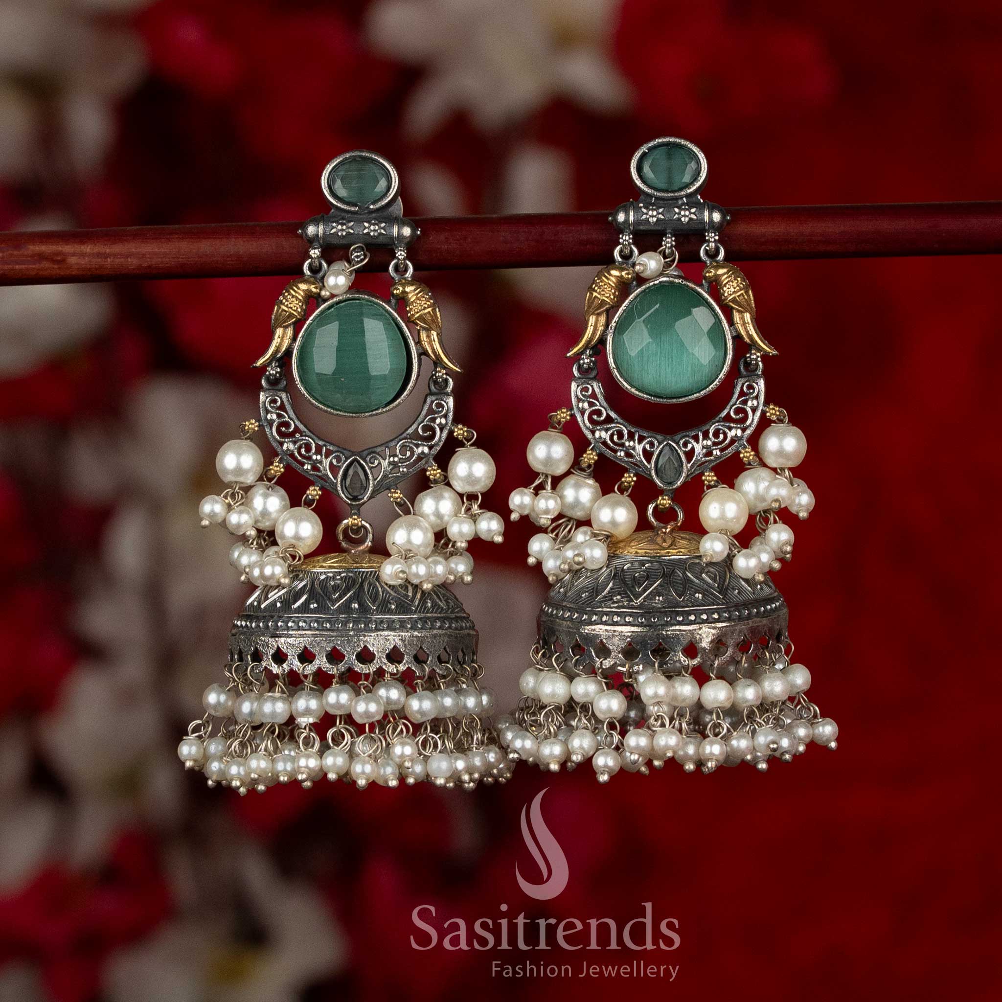 Fresh dual tone 92.5 silver plated oxidised bird crescent dangler earrings mint colour for daytime celebrations Sasitrends