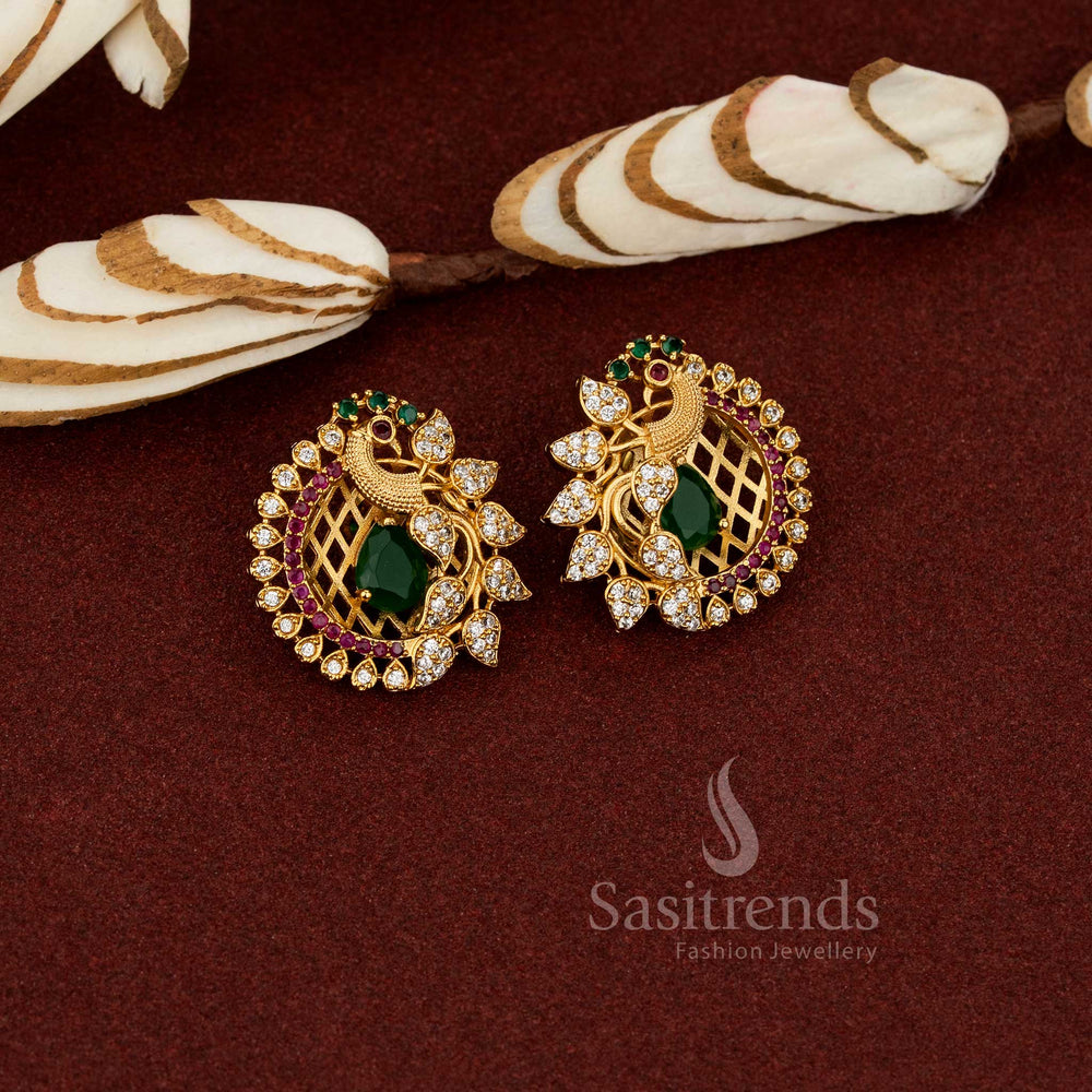 Elegant feathered peacock stud earrings crafted in temple matte gold plating with AD stones for women green - Sasitrends