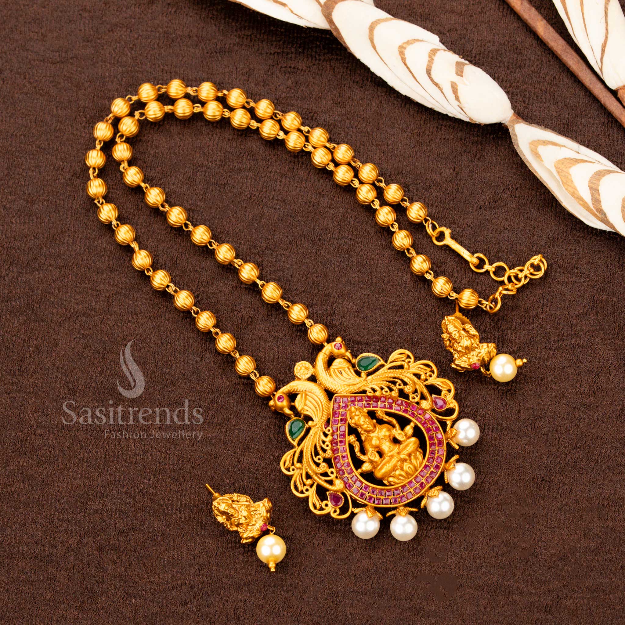 Temple Matte Gold Ruby-Green Lakshmi Pendant Necklace with Pearl Drops – Traditional temple style jewellery for saree wear – Sasitrends