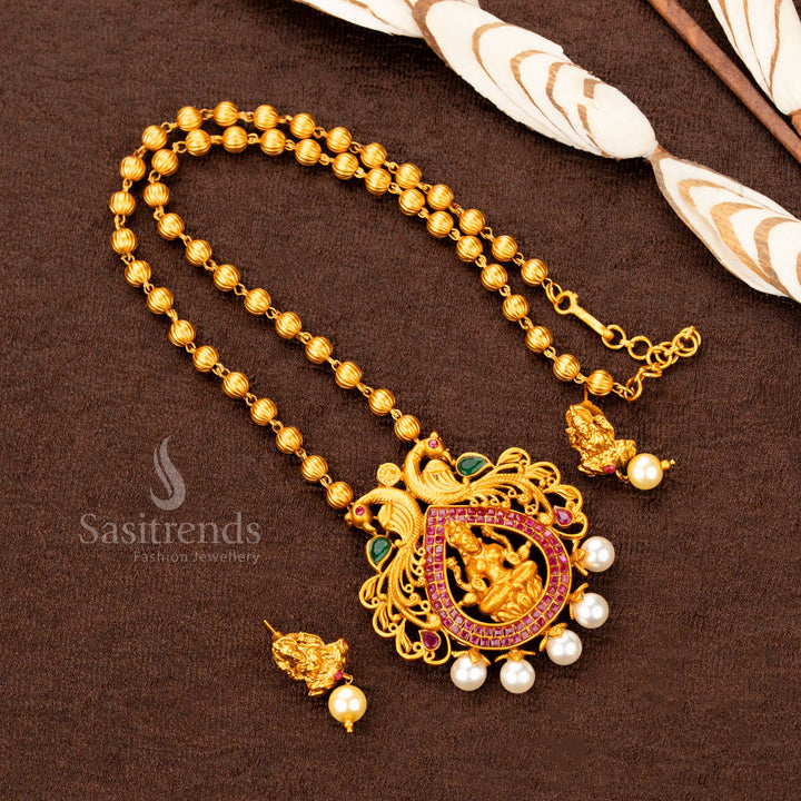 Temple Matte Gold Ruby-Green Lakshmi Pendant Necklace with Pearl Drops – Traditional temple style jewellery for saree wear – Sasitrends