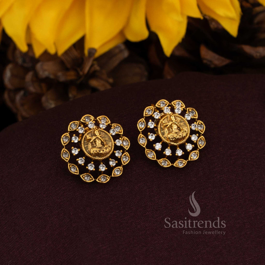 Regal white circular floral stud earrings with Krishna motif in matte gold crafted with ornamental elegance for majestic cultural occasions and aristocratic heritage jewellery – Sasitrends